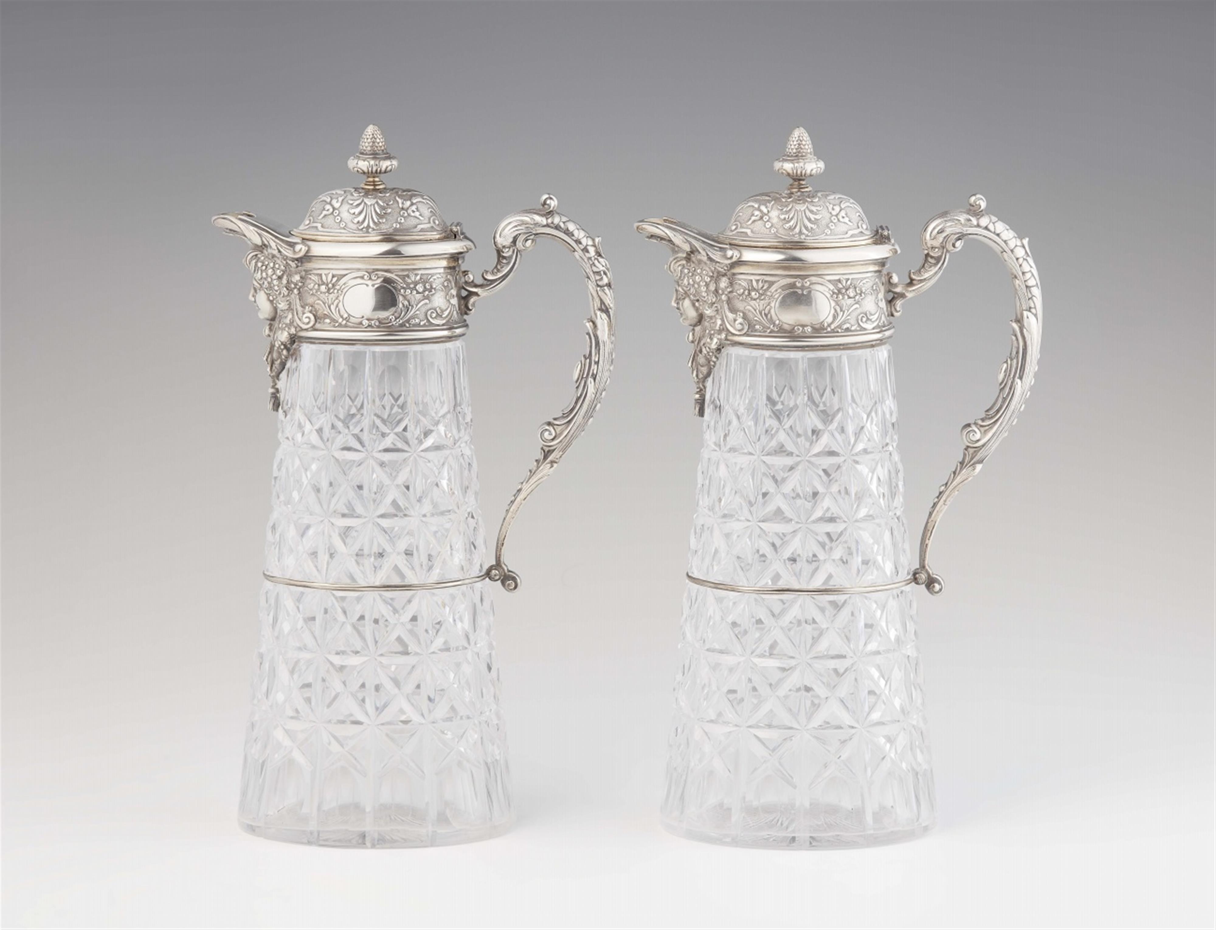A pair of Bremen silver mounted glass carafes - image-1