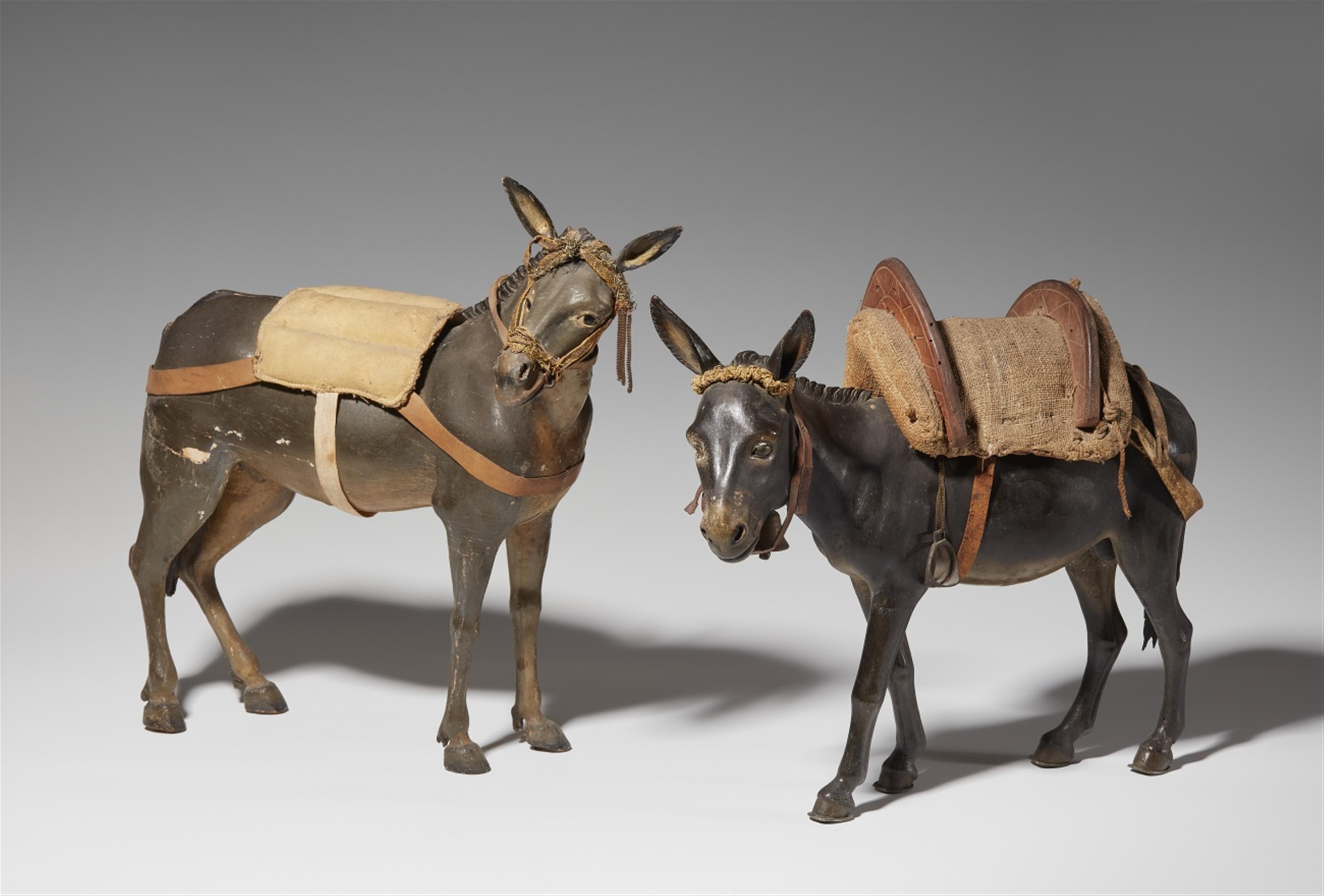 Two wooden donkeys from a Nativity scene - image-1