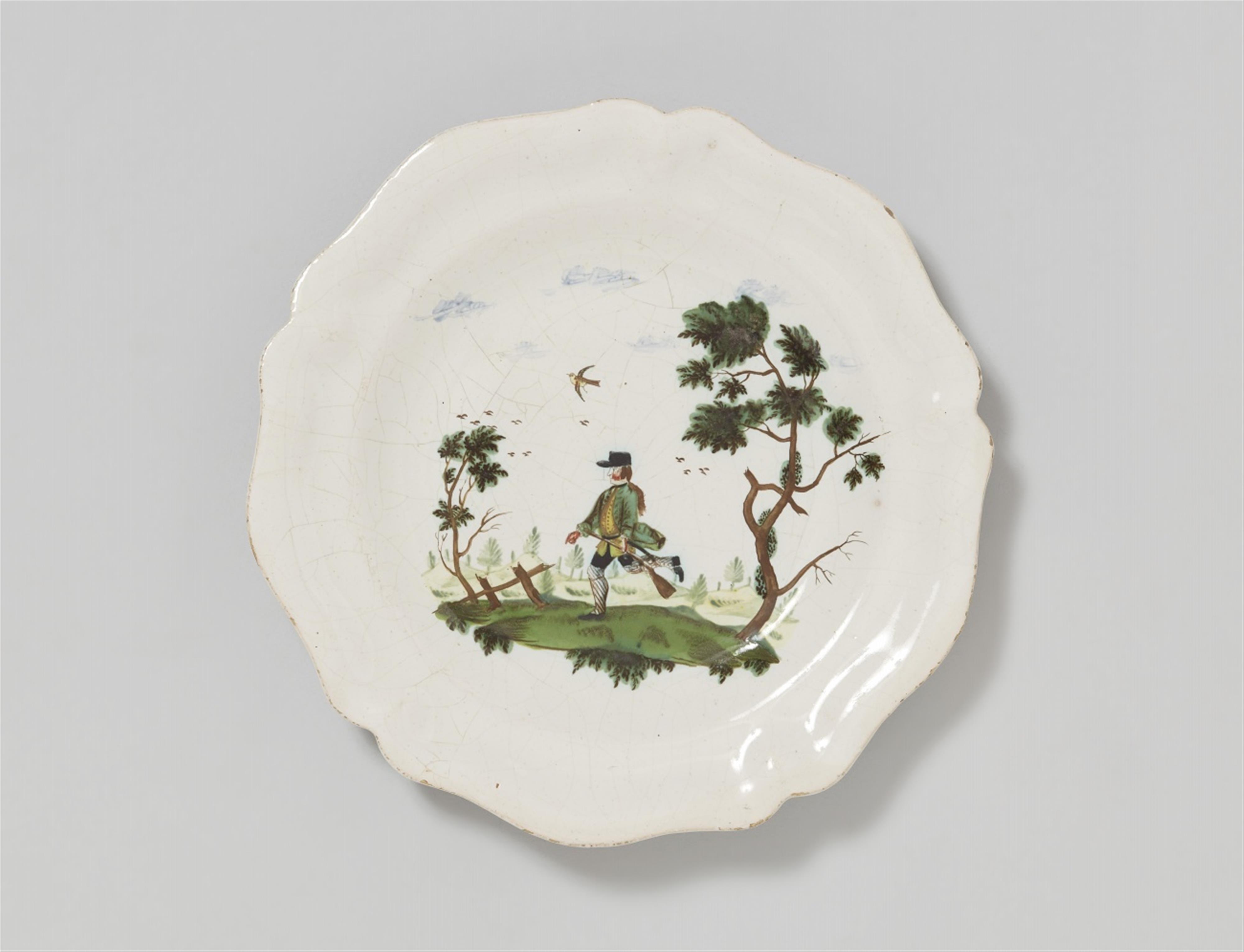A faience plate with a hunting motif - image-1