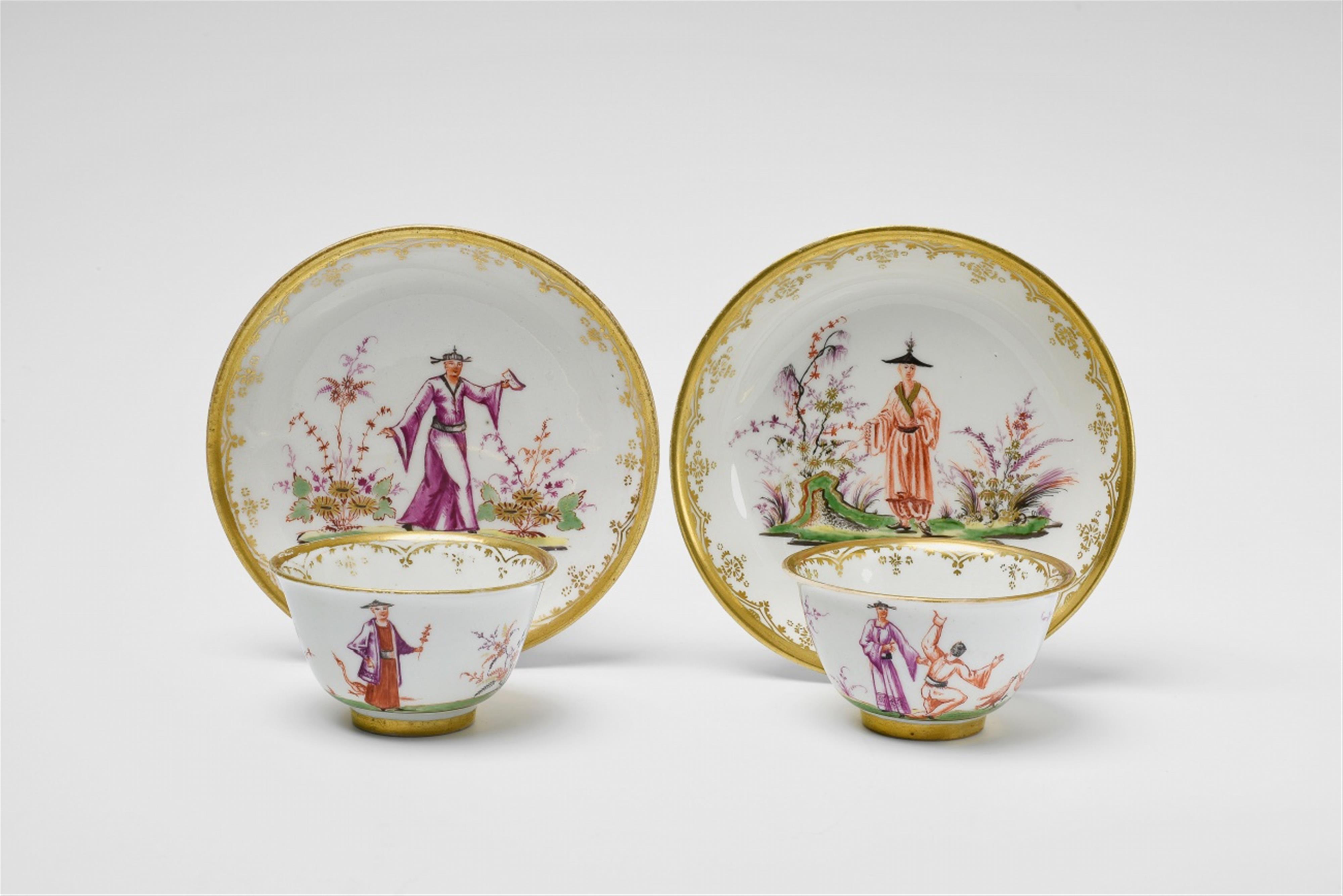 Two Meissen porcelain tea bowls and saucers with chinoiserie decor - image-1