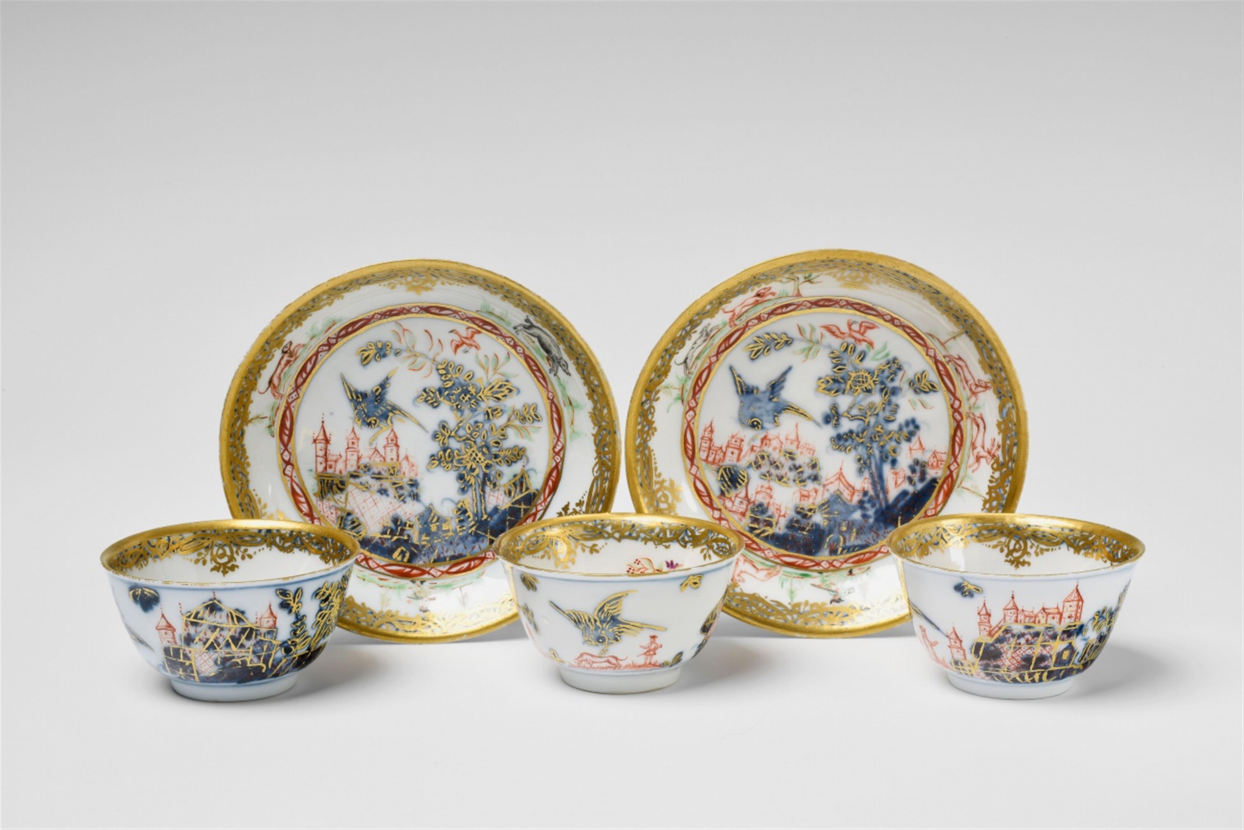 Five items from a Meissen porcelain service with bird and rock decor - image-1