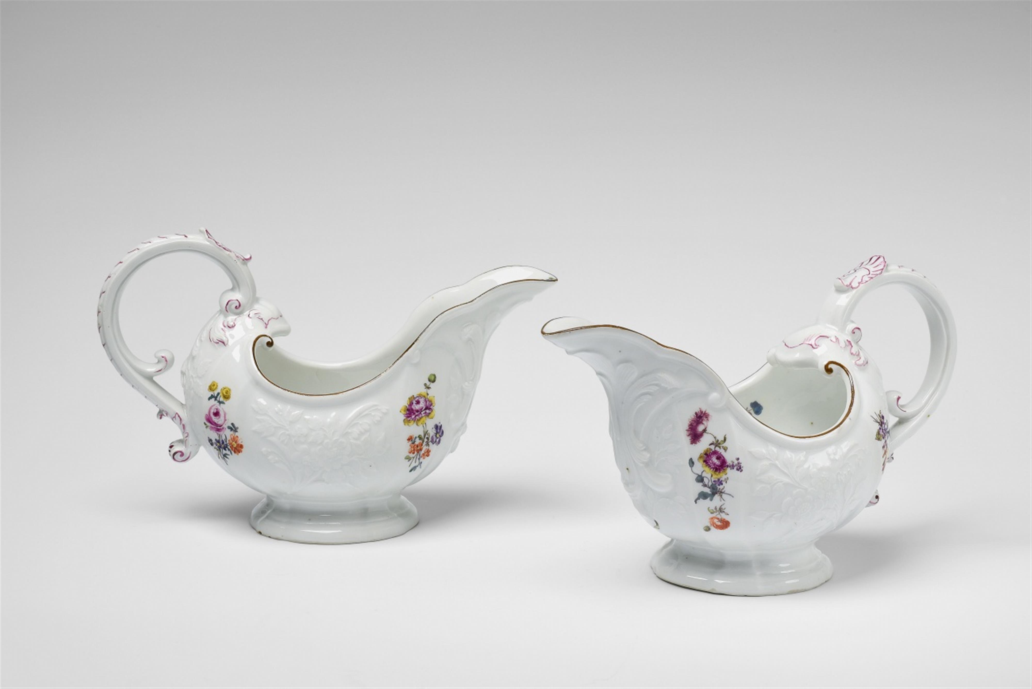 A pair of Meissen porcelain sauce boats from a service with wild flower décor - image-1