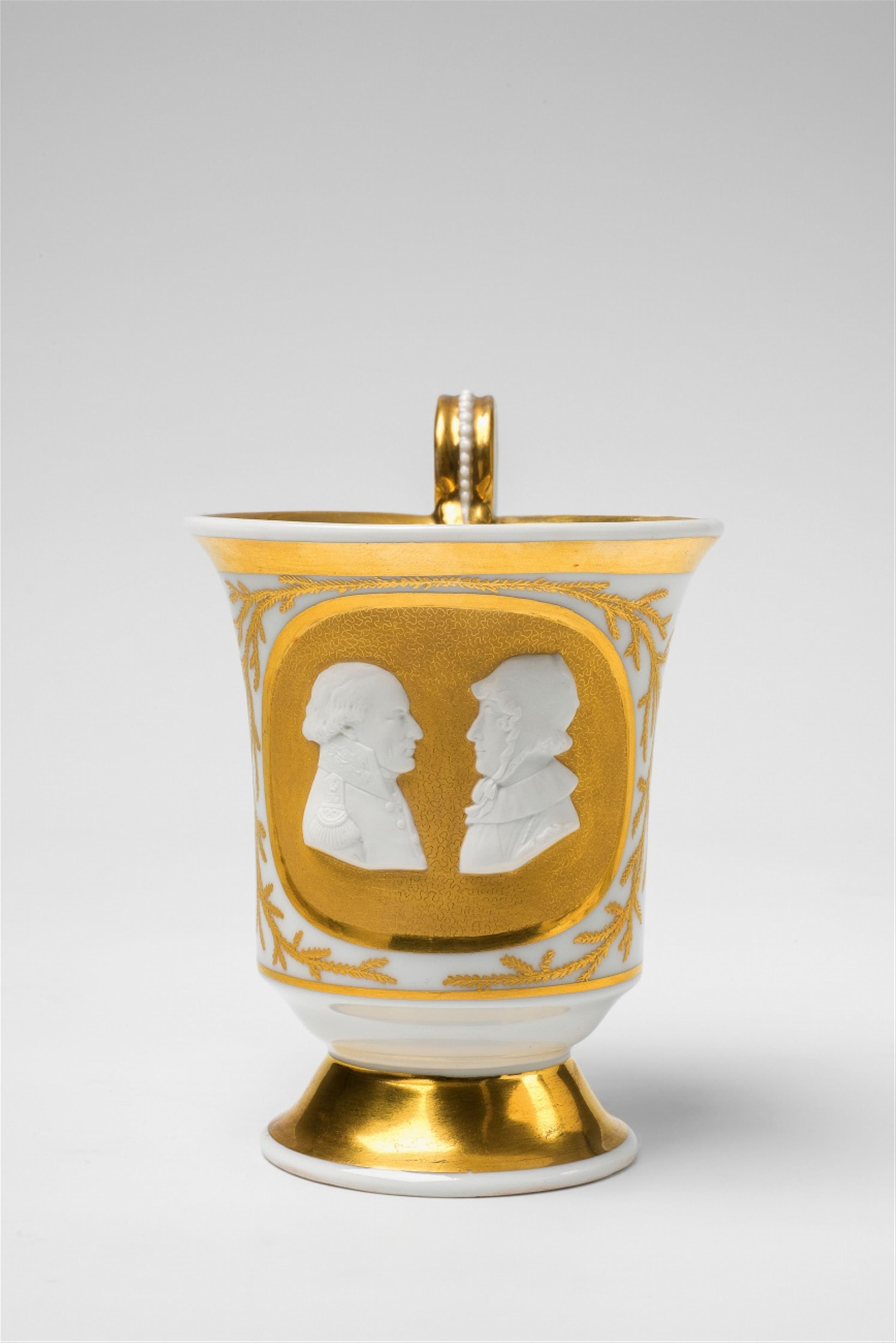 A Berlin KPM porcelain cup with relief portraits of Friedrich Philipp Rosenstiel and his wife - image-1