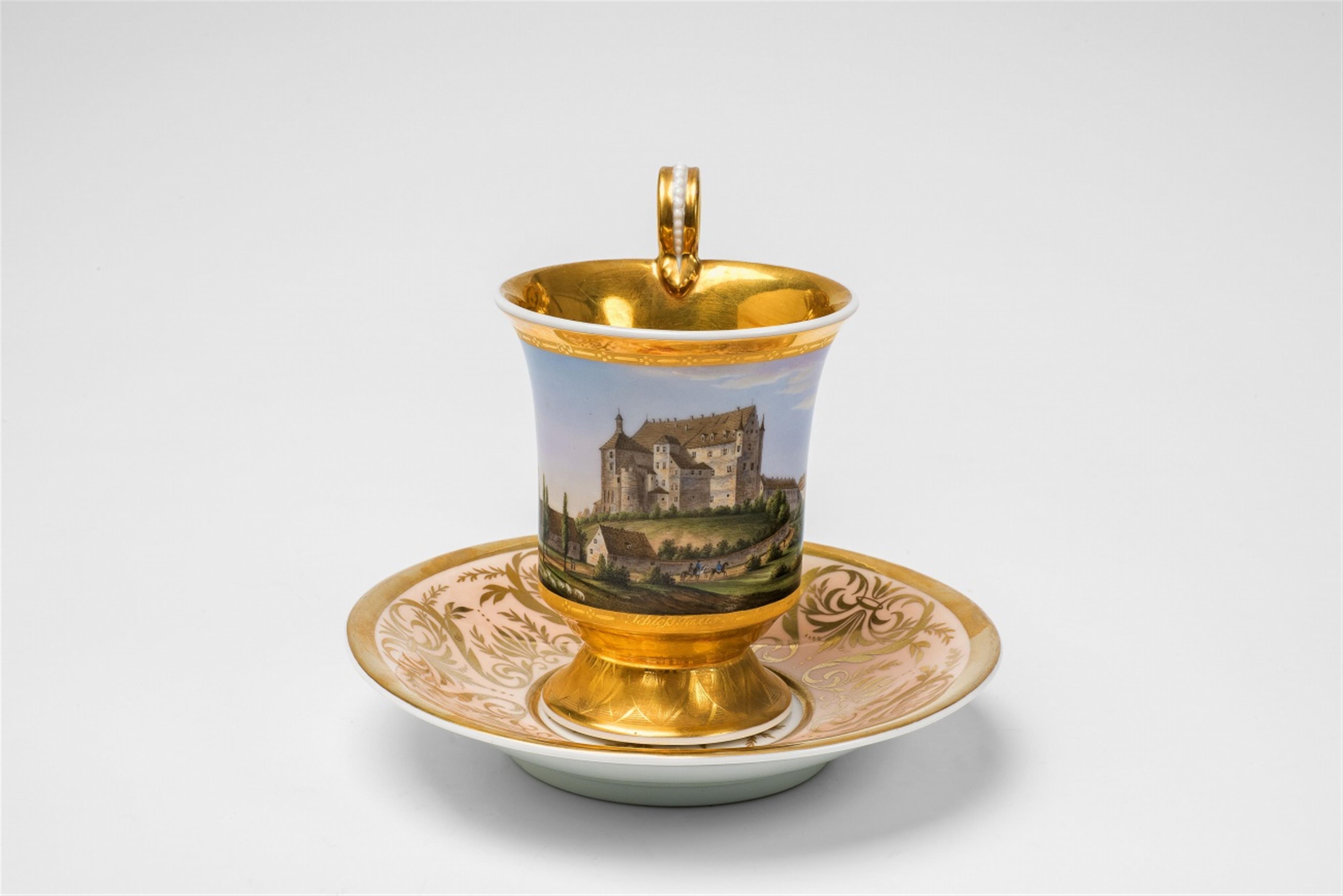 A Berlin KPM porcelain cup with a view of Taxis Castle - image-1