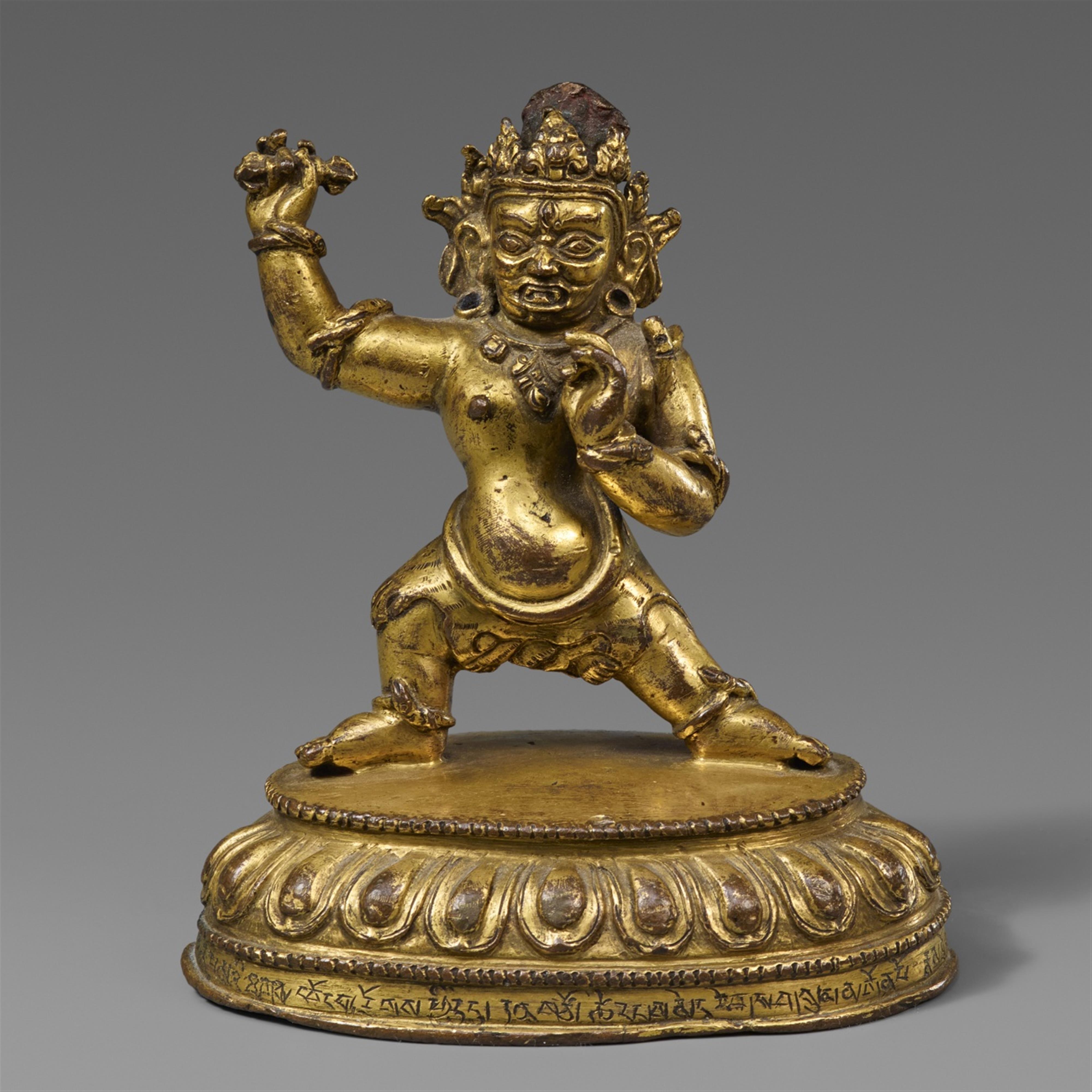 A Tibetan gilt bronze figure of Vajrapani. 15th century  - image-1
