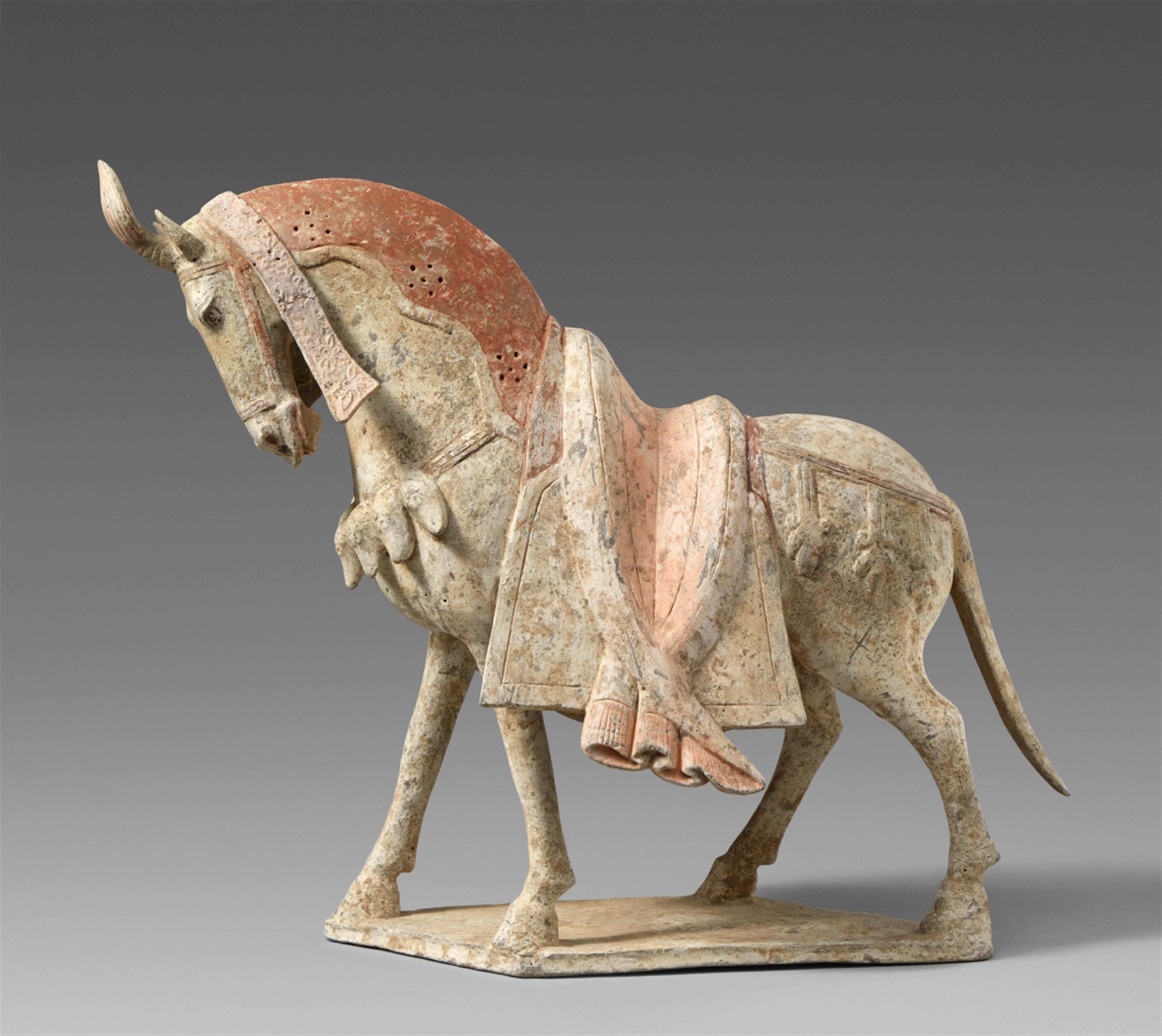 A pottery figure of a caparisoned horse. Northern Wei dynasty (386-534) - image-1