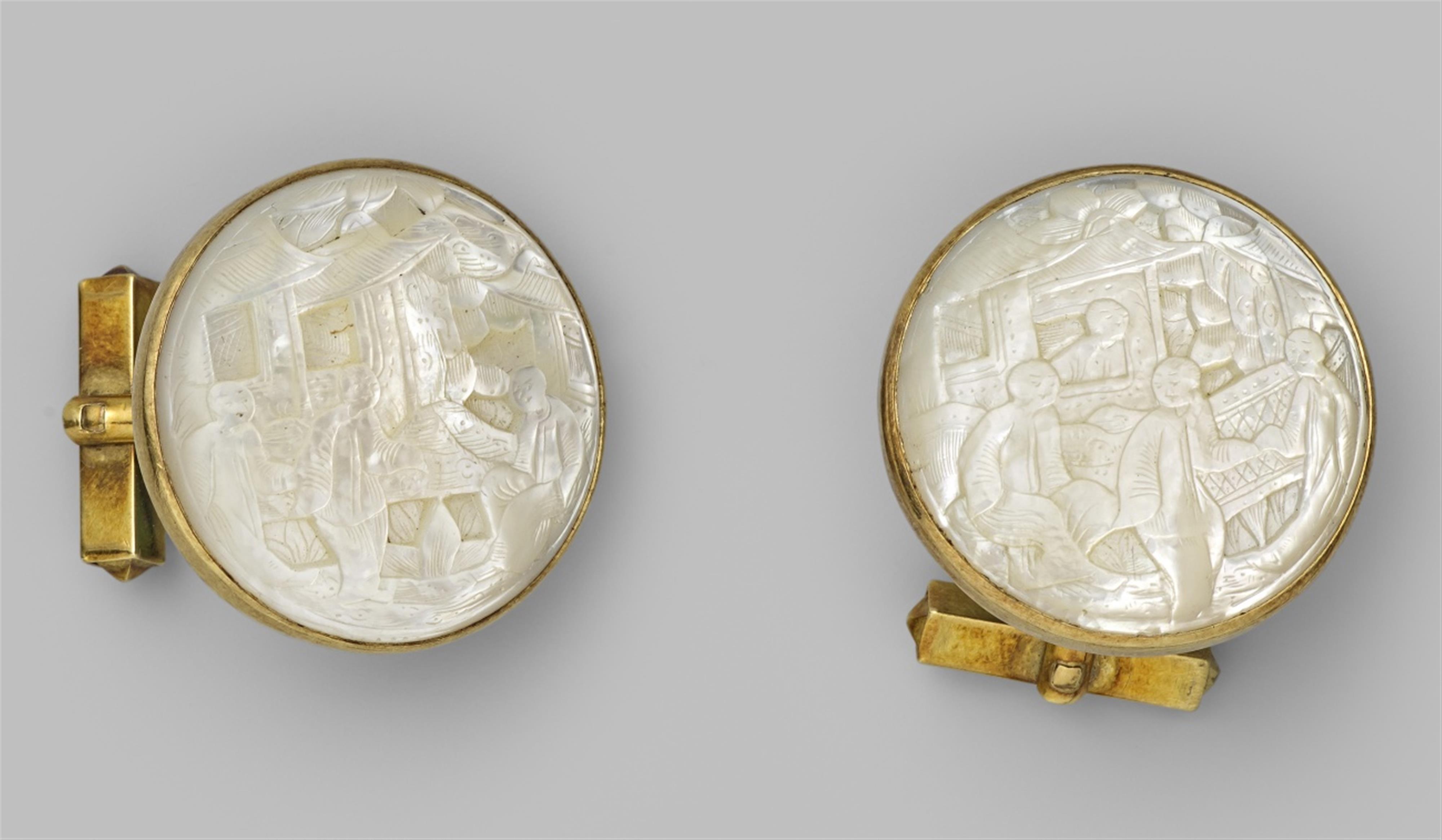 A pair of mother-of-pearl and gold cufflinks. Late 19th century - image-1