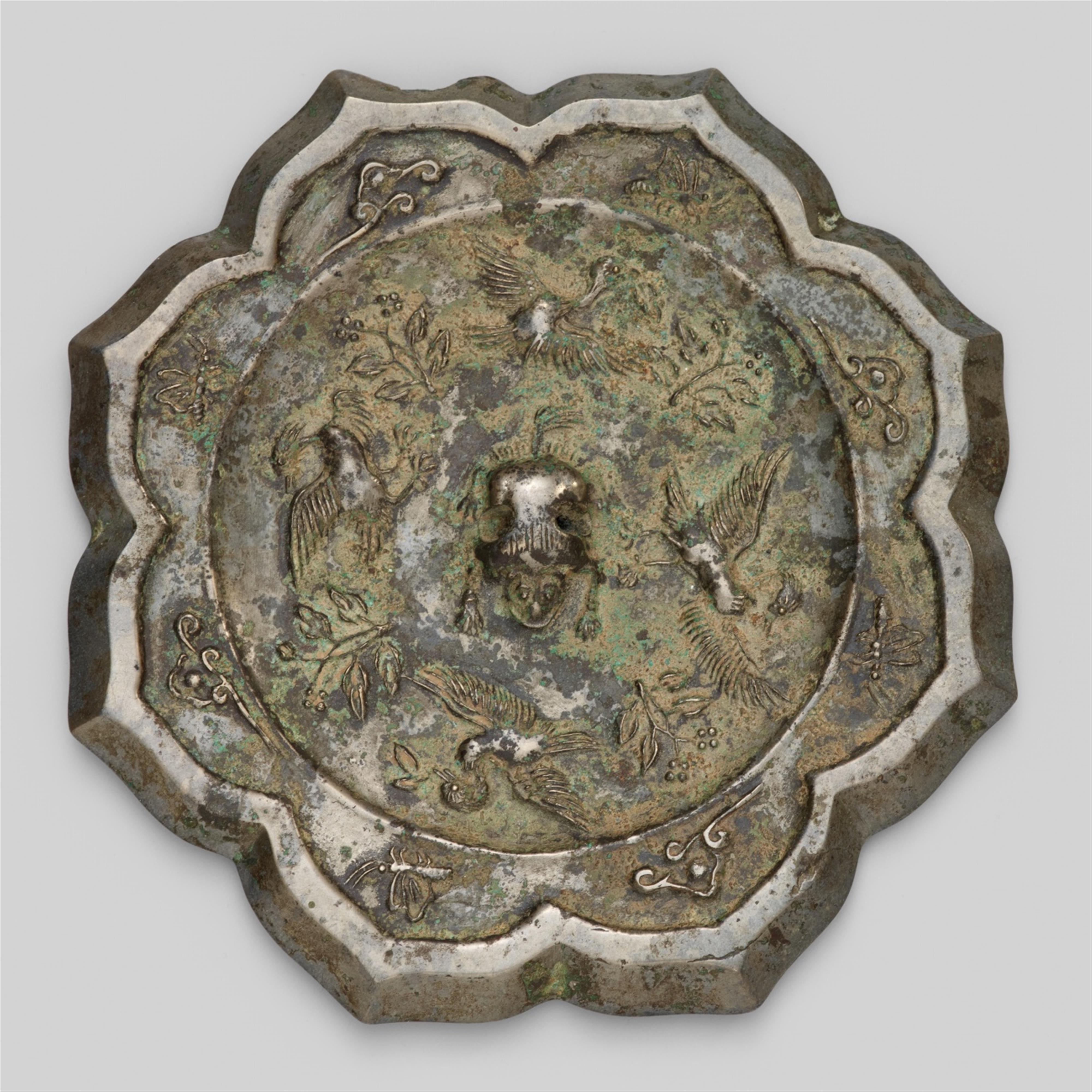 A silvery bronze mirror. Tang dynasty - image-1