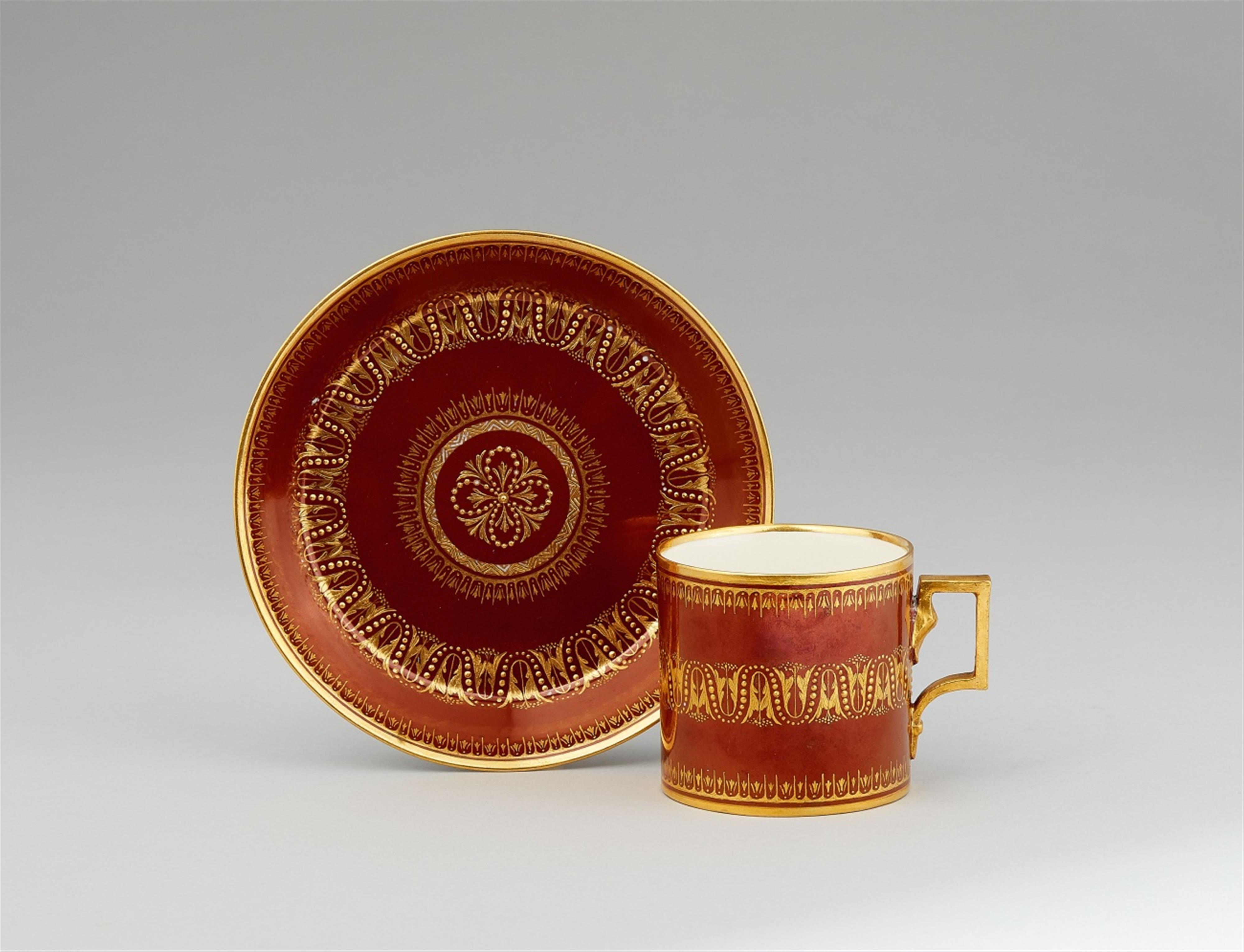 A Vienna porcelain cup and saucer with gilt tendrils - image-1