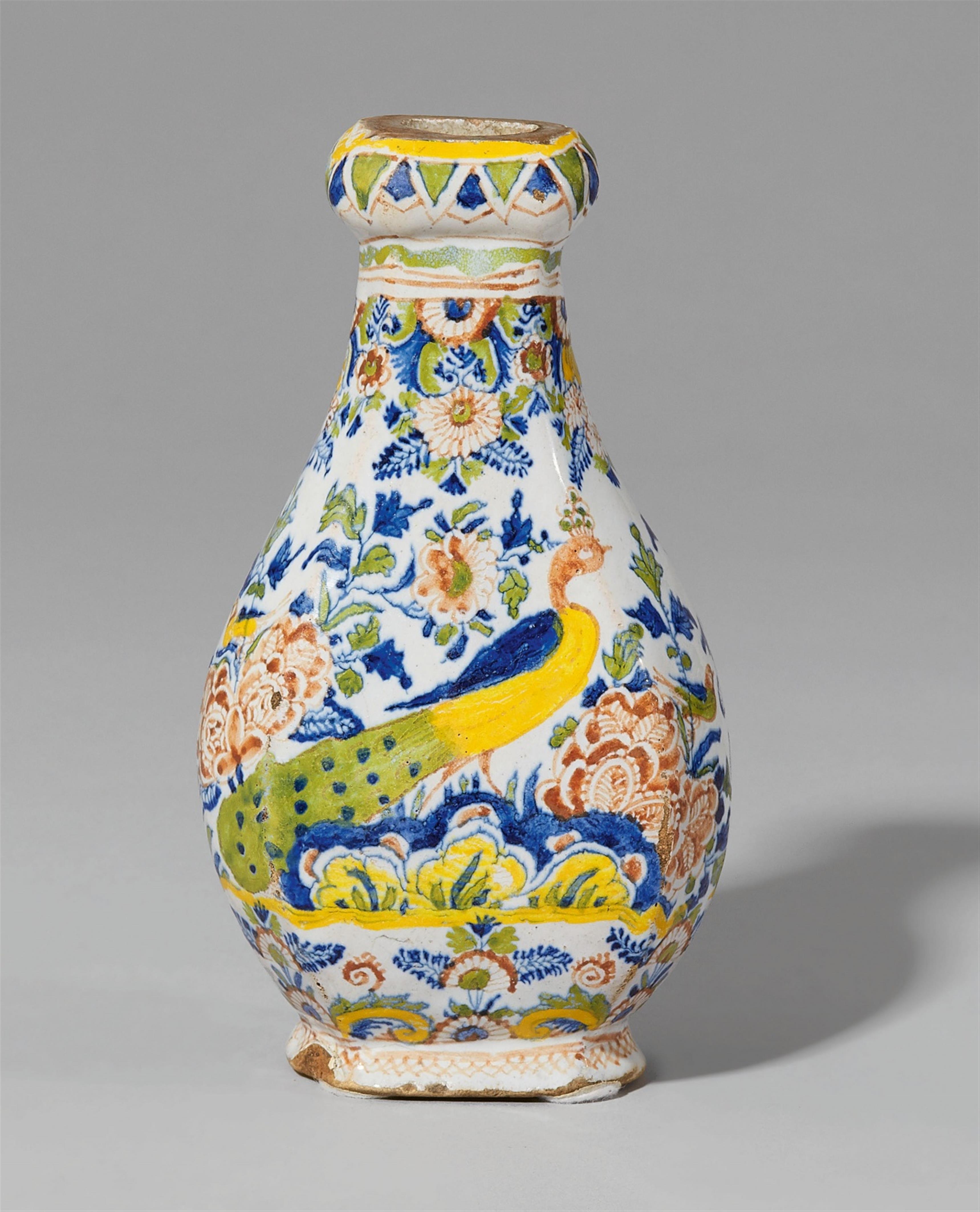 A small Berlin faience vase with peacock decor - image-1