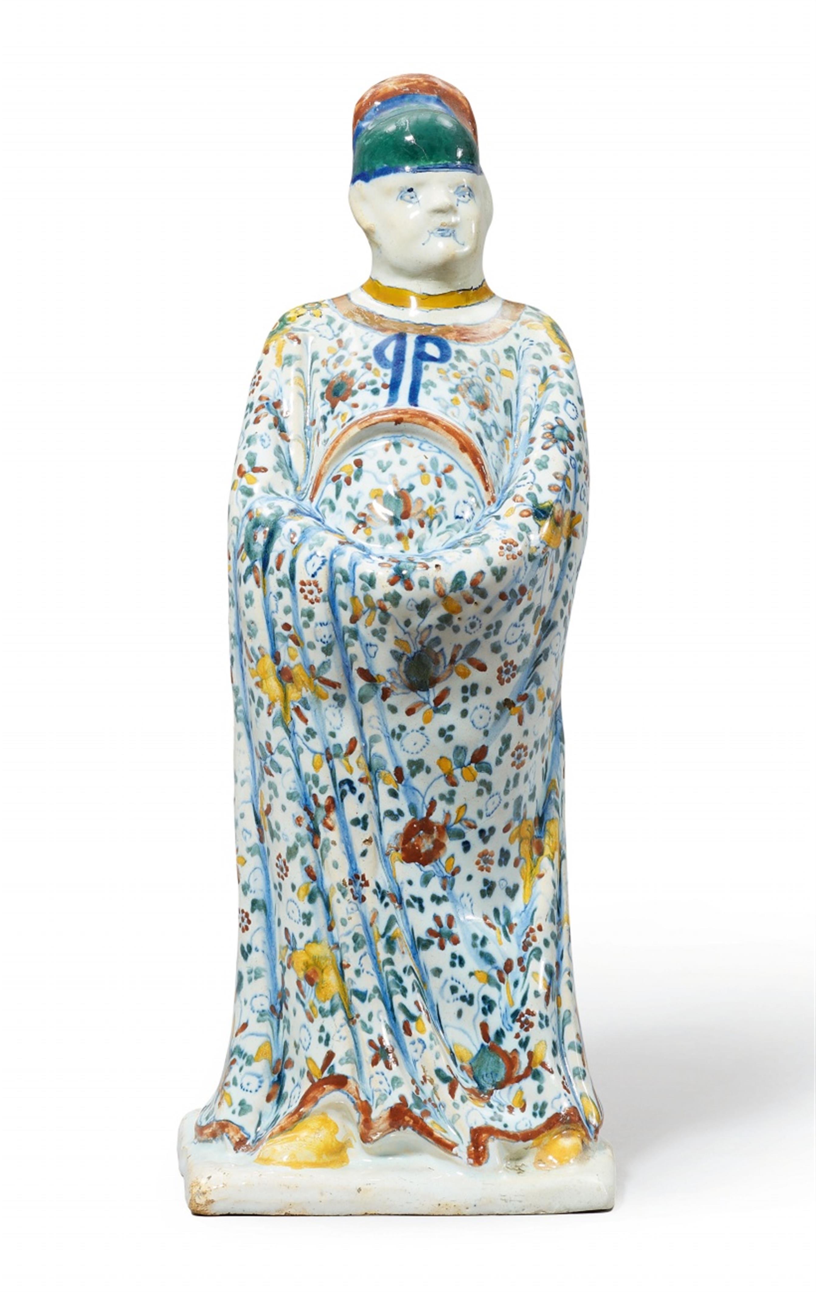 A rare Berlin faience figure of a Chinese official - image-1