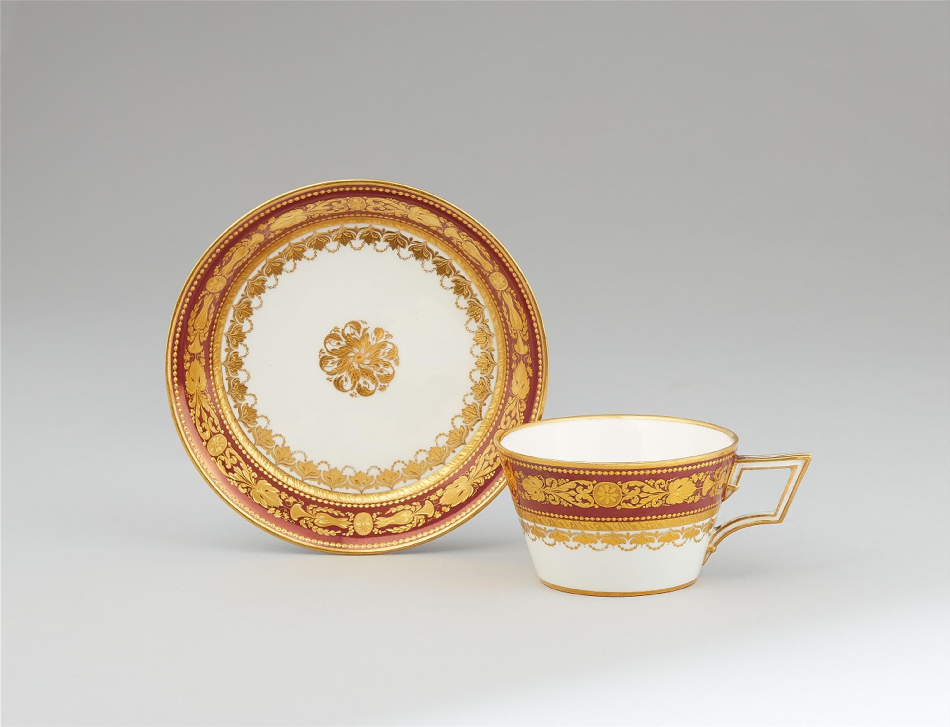 A Vienna porcelain cup and saucer with a lustre border - image-1