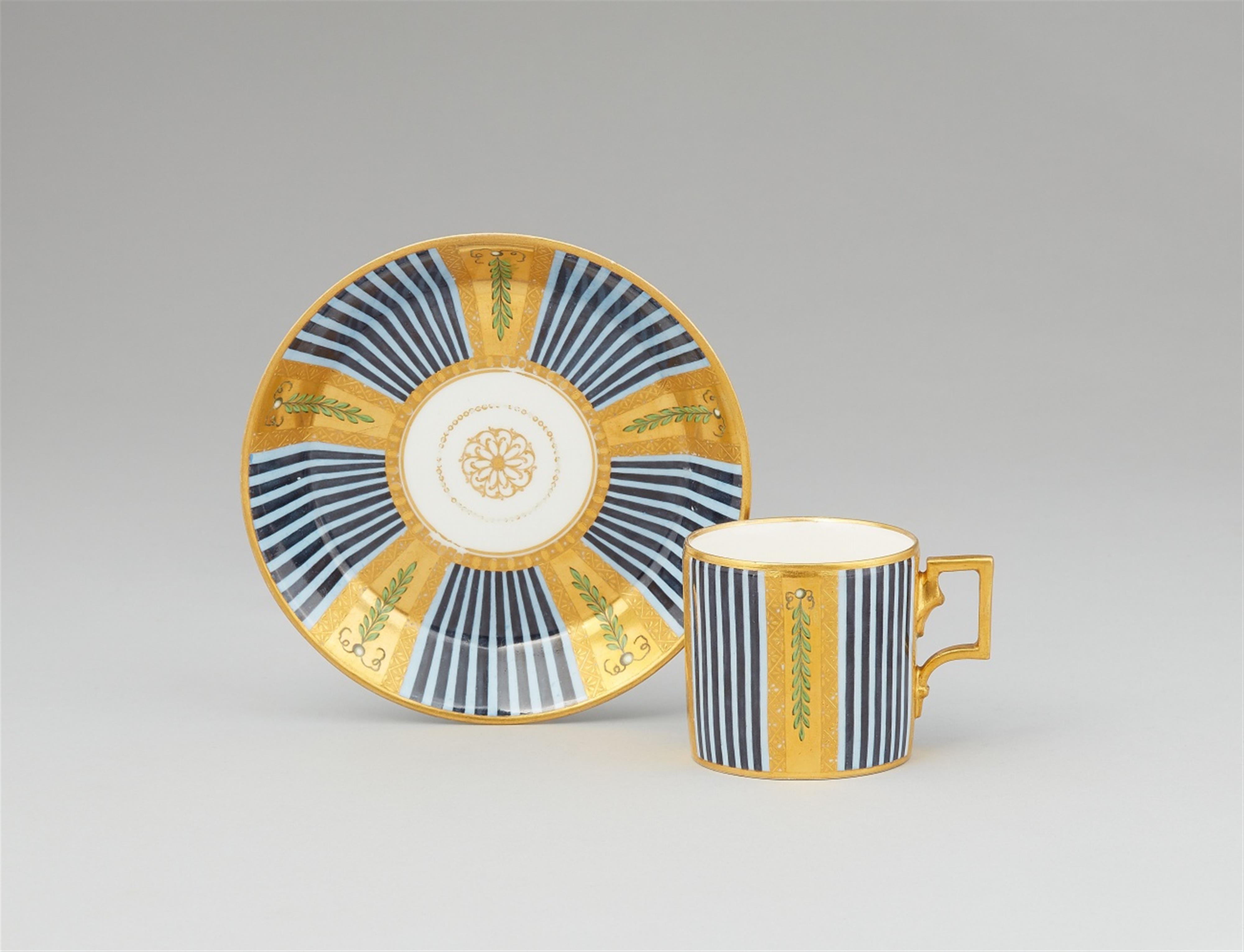 A Vienna porcelain cup and saucer with blue striped decor - image-1