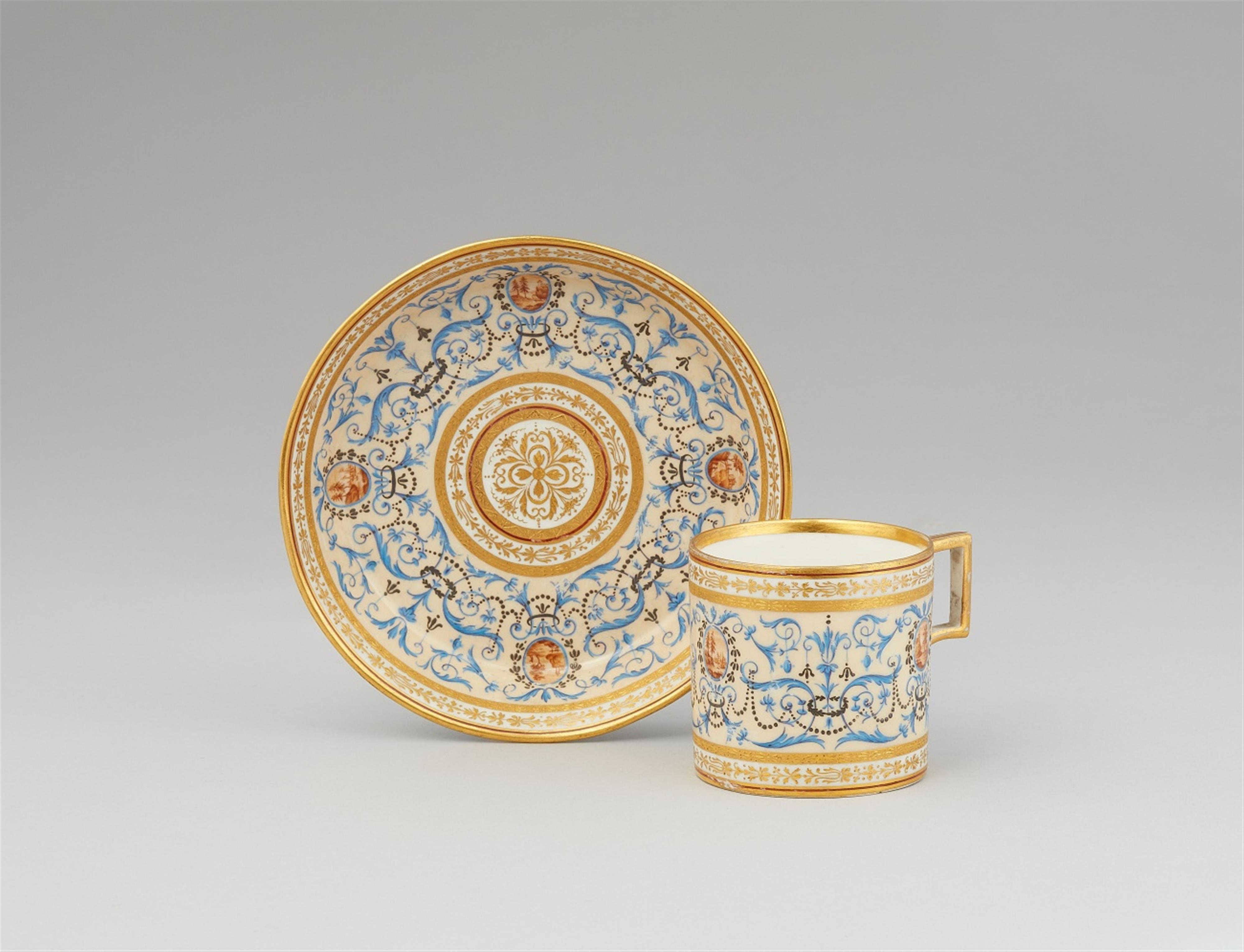 A Vienna porcelain cup and saucer with blue arabesques - image-1