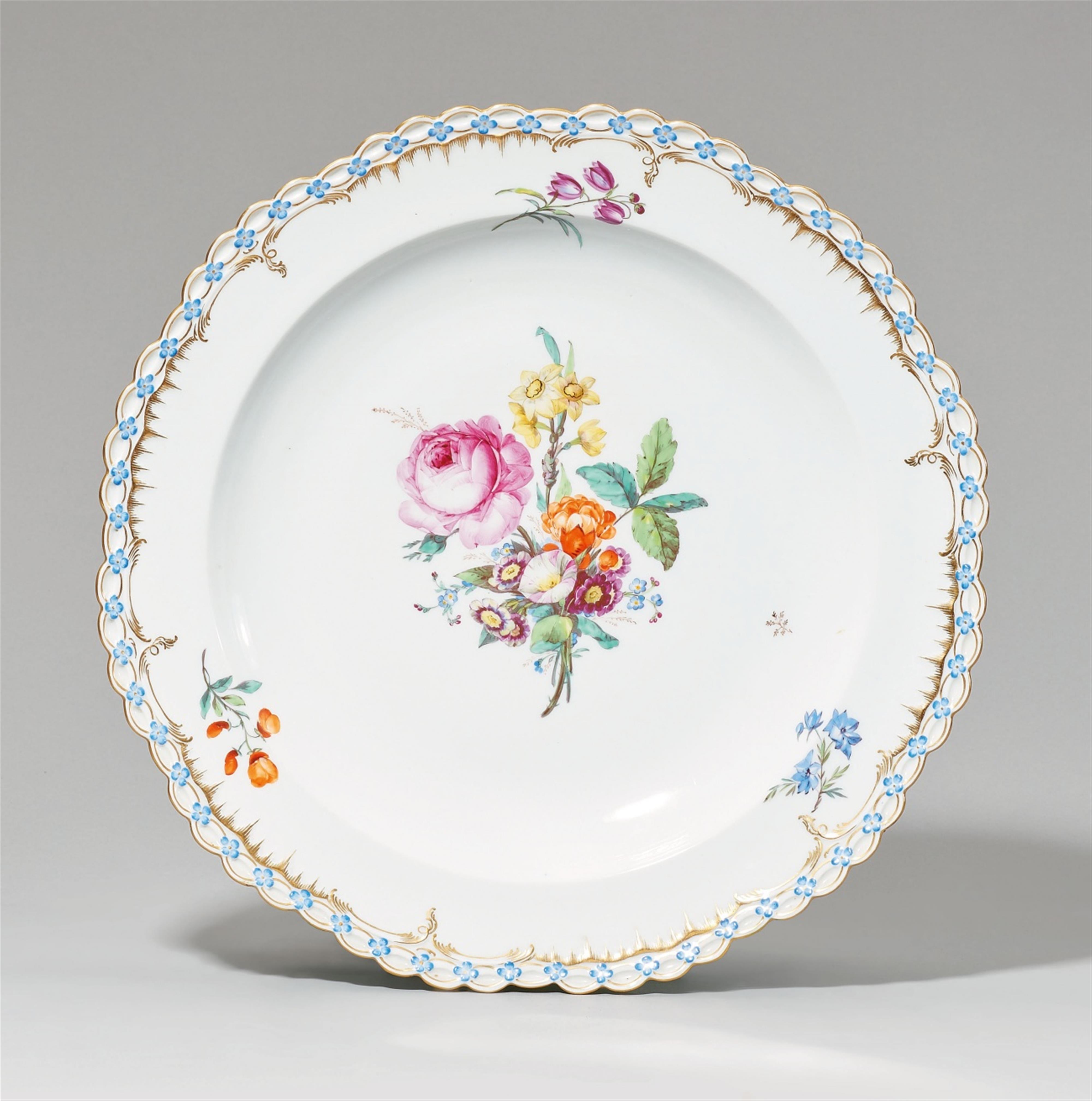 A round Berlin KPM porcelain platter with a bouquet - image-1