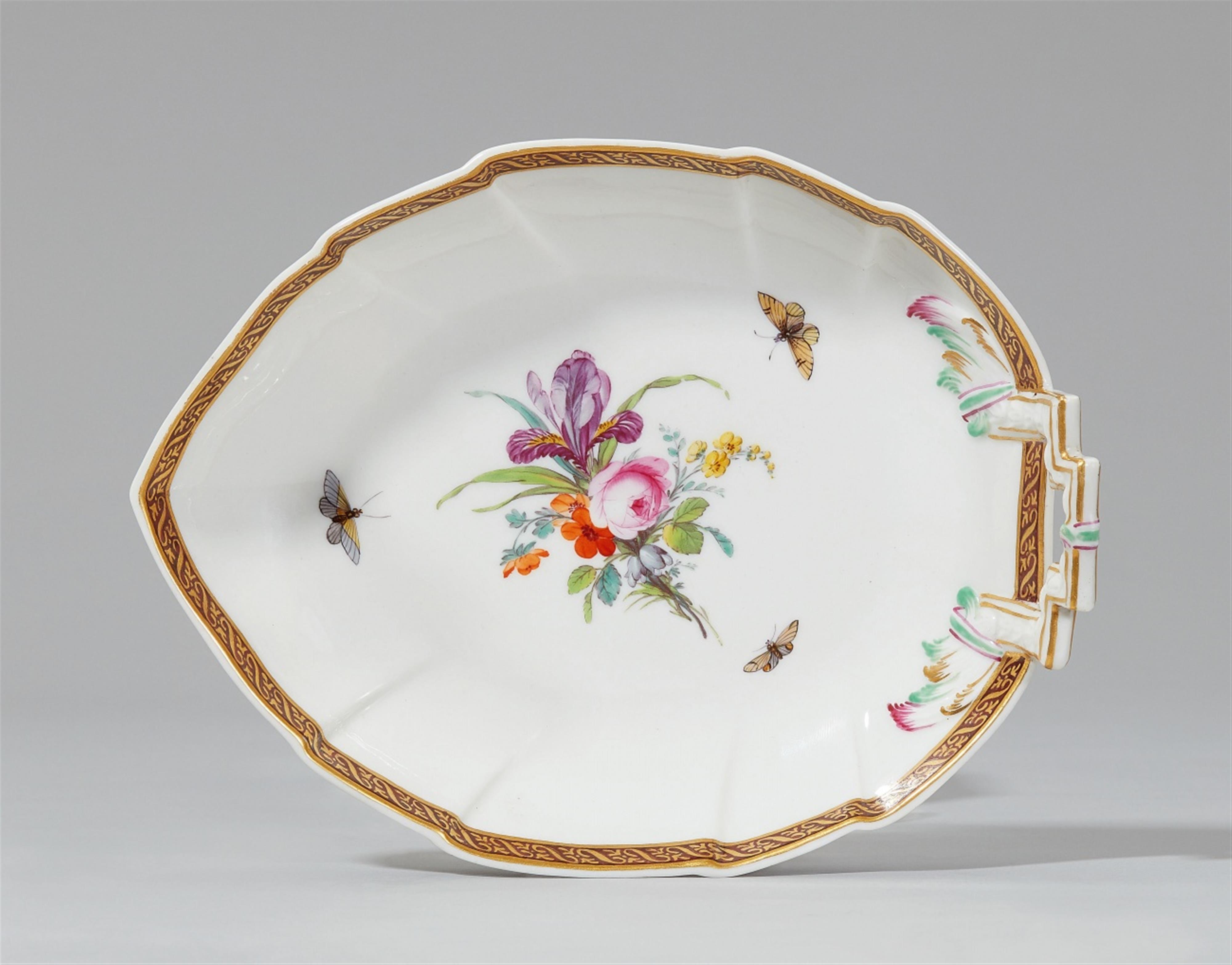 A Berlin KPM porcelain leaf-form dish with flower and insect decor - image-1