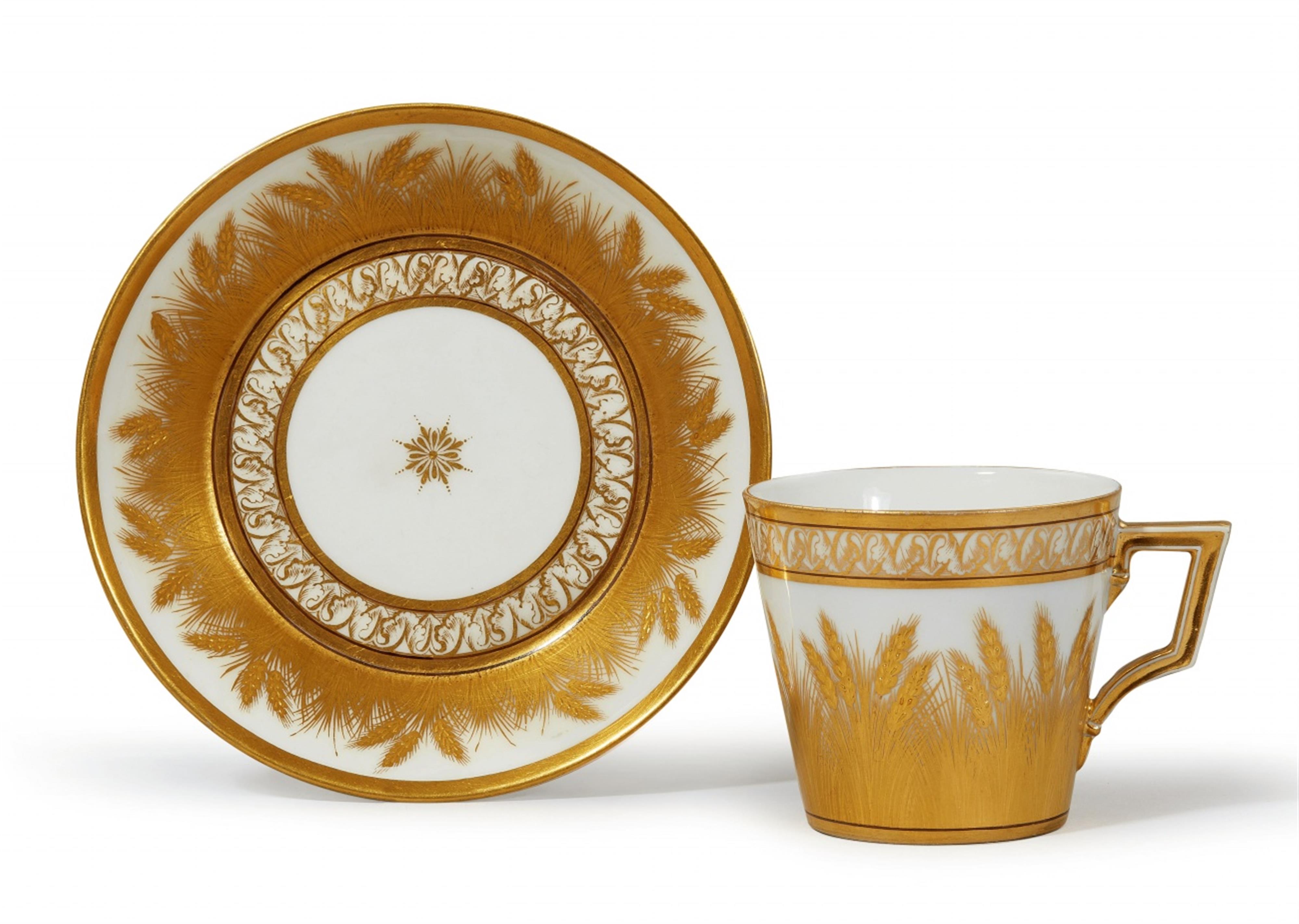 A Berlin KPM porcelain cup and saucer with wheatsheafs - image-1
