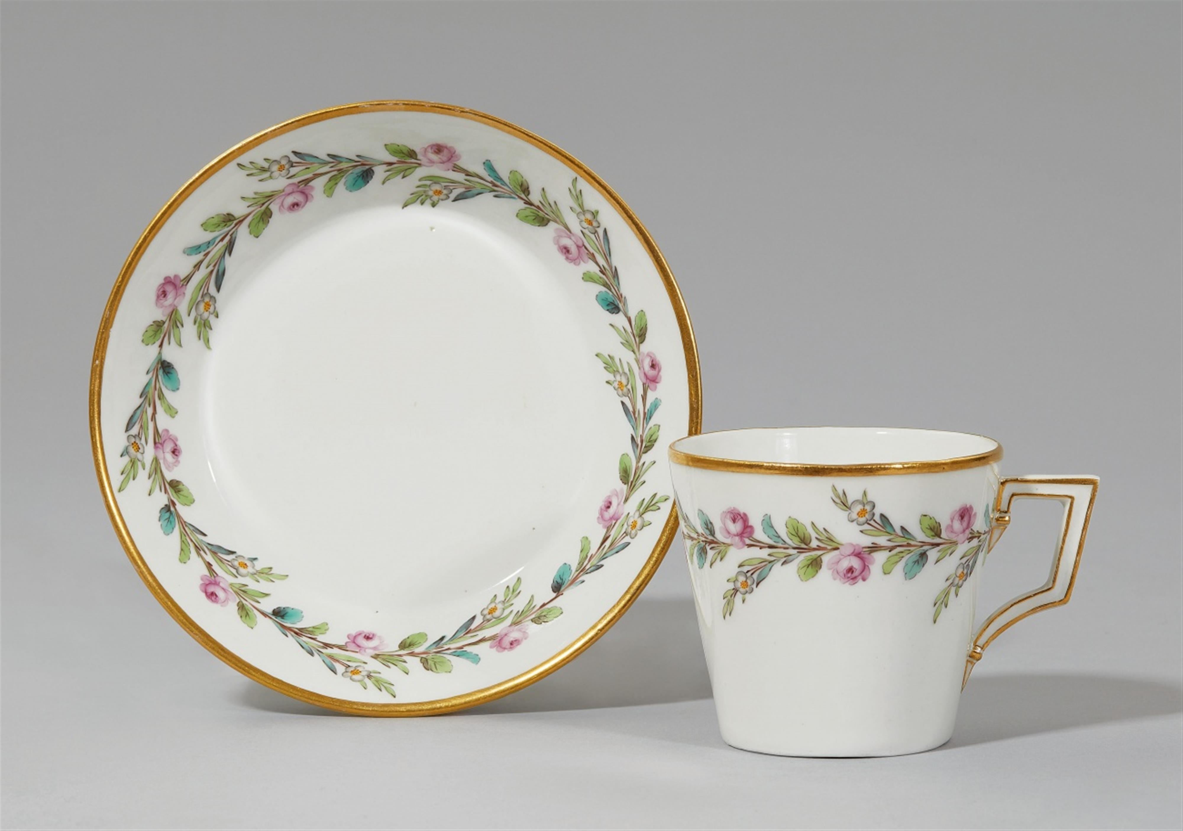 A Berlin KPM porcelain cup and saucer with rose tendrils - image-2
