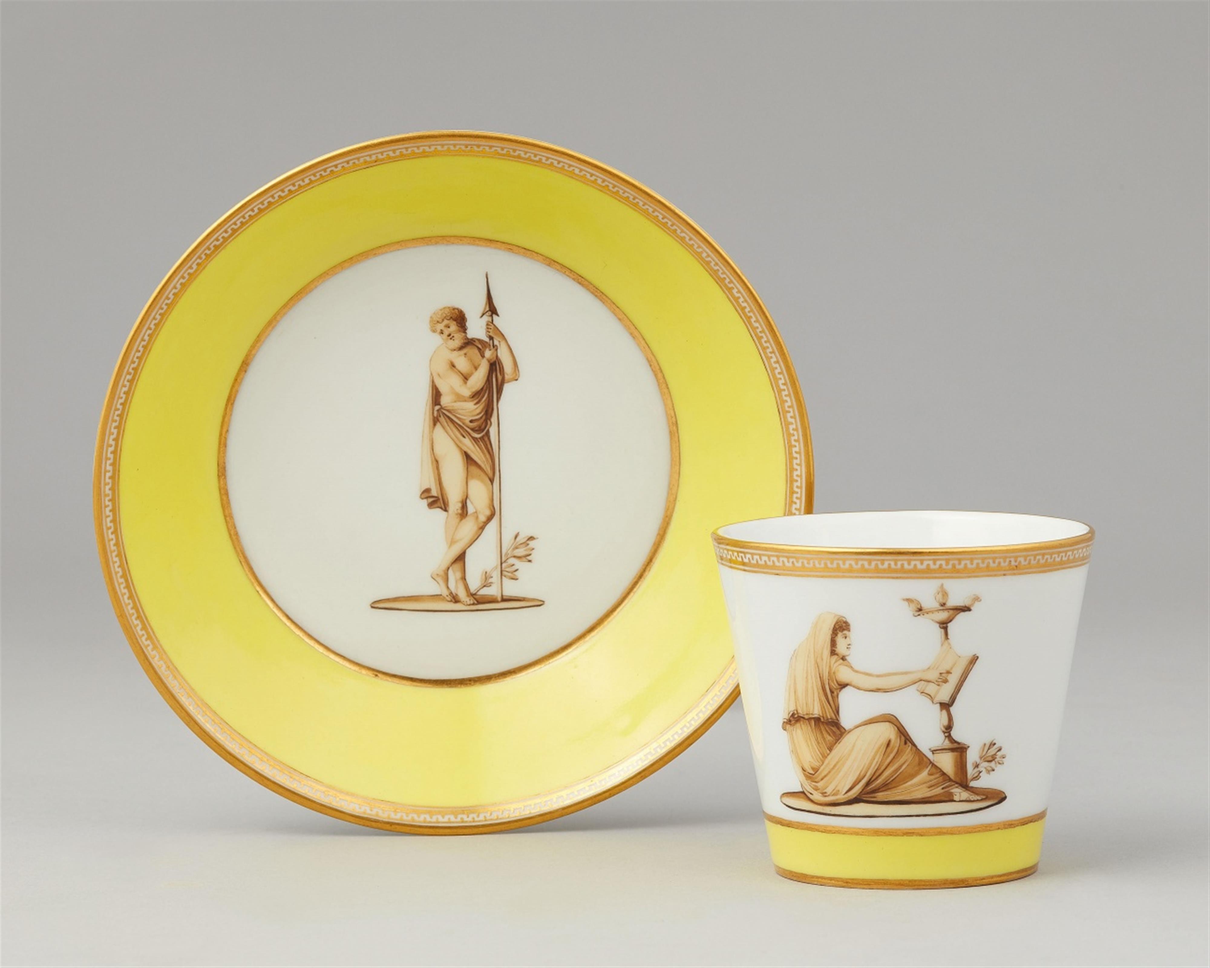 A Berlin KPM porcelain cup and saucer with Neoclassical figures - image-1