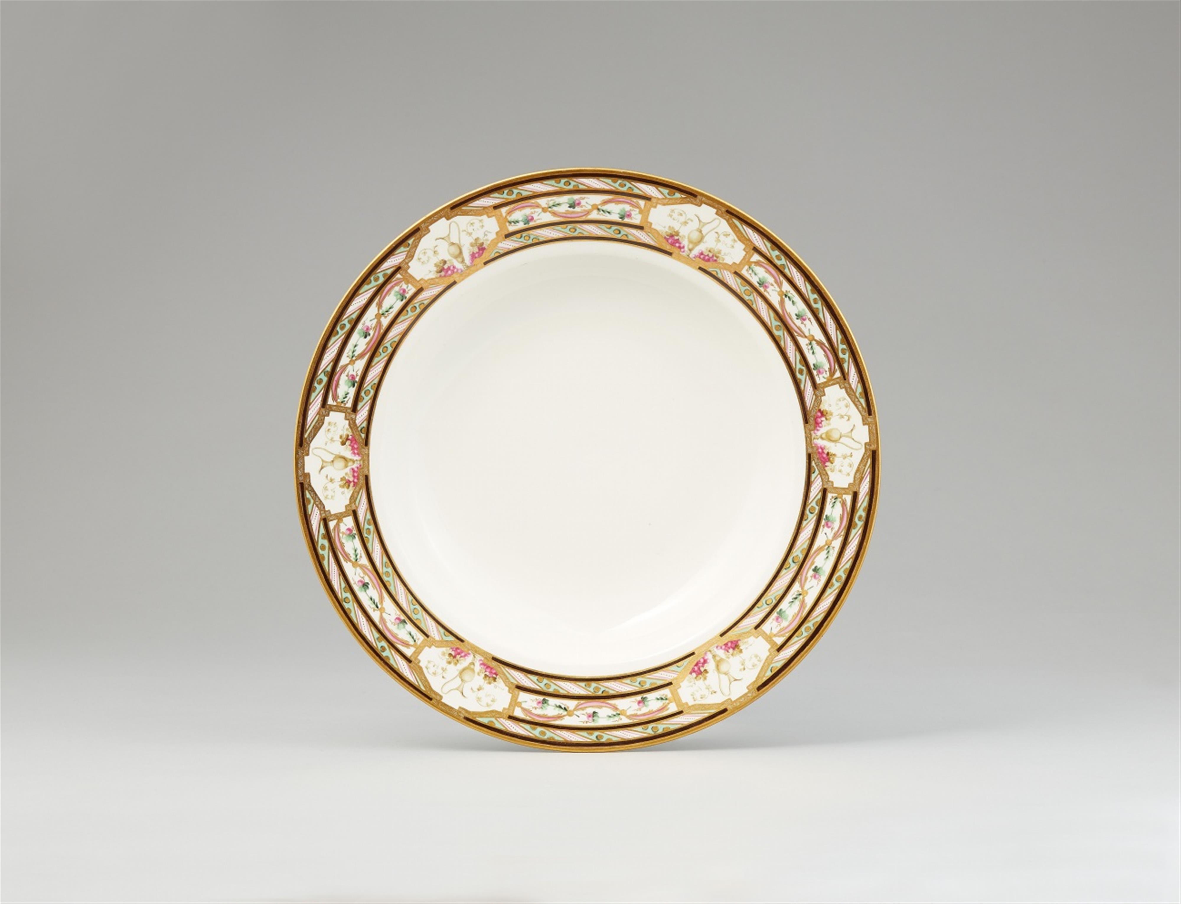 A Vienna porcelain dinner plate with vase decor - image-1