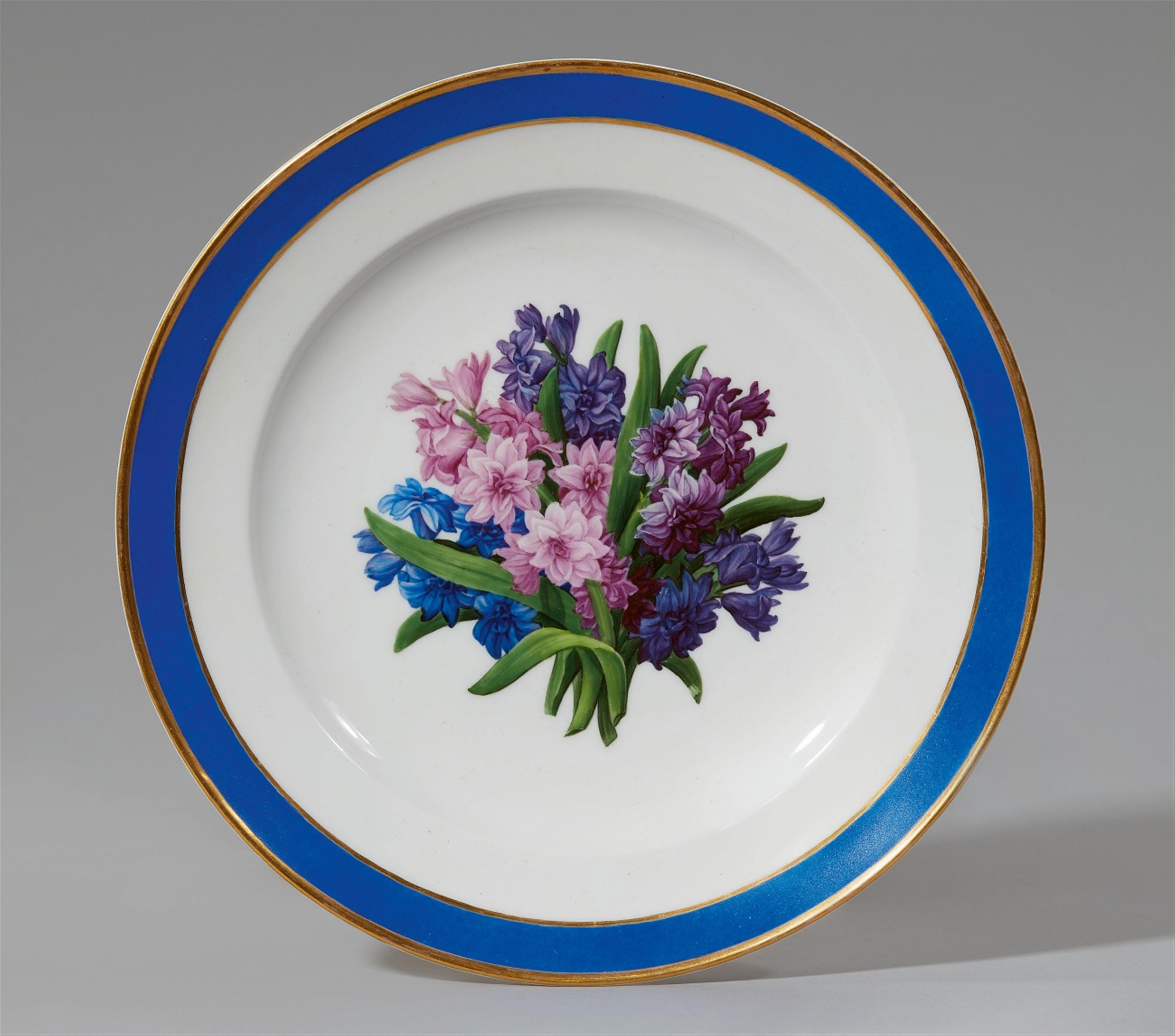 A Berlin KPM porcelain botanical plate with a hyacinth - image-1