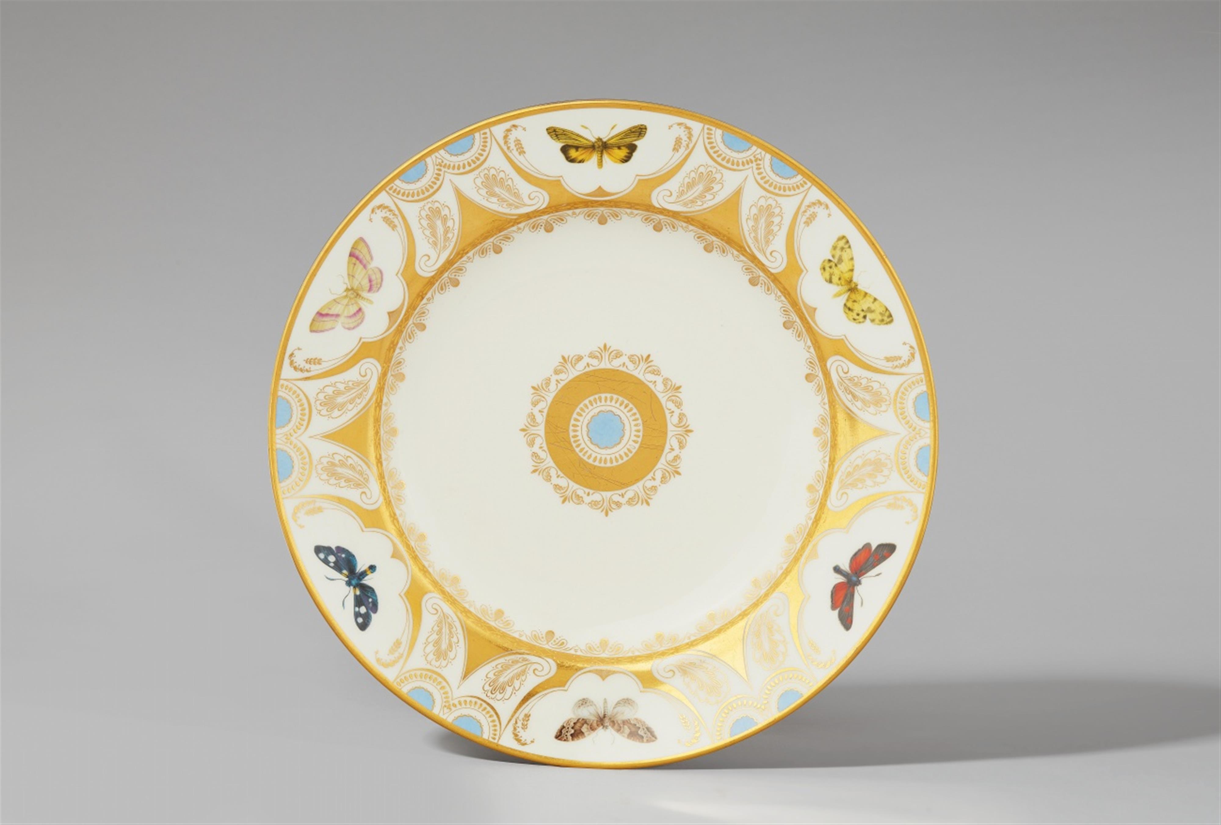 A Vienna porcelain plate with butterflies - image-1