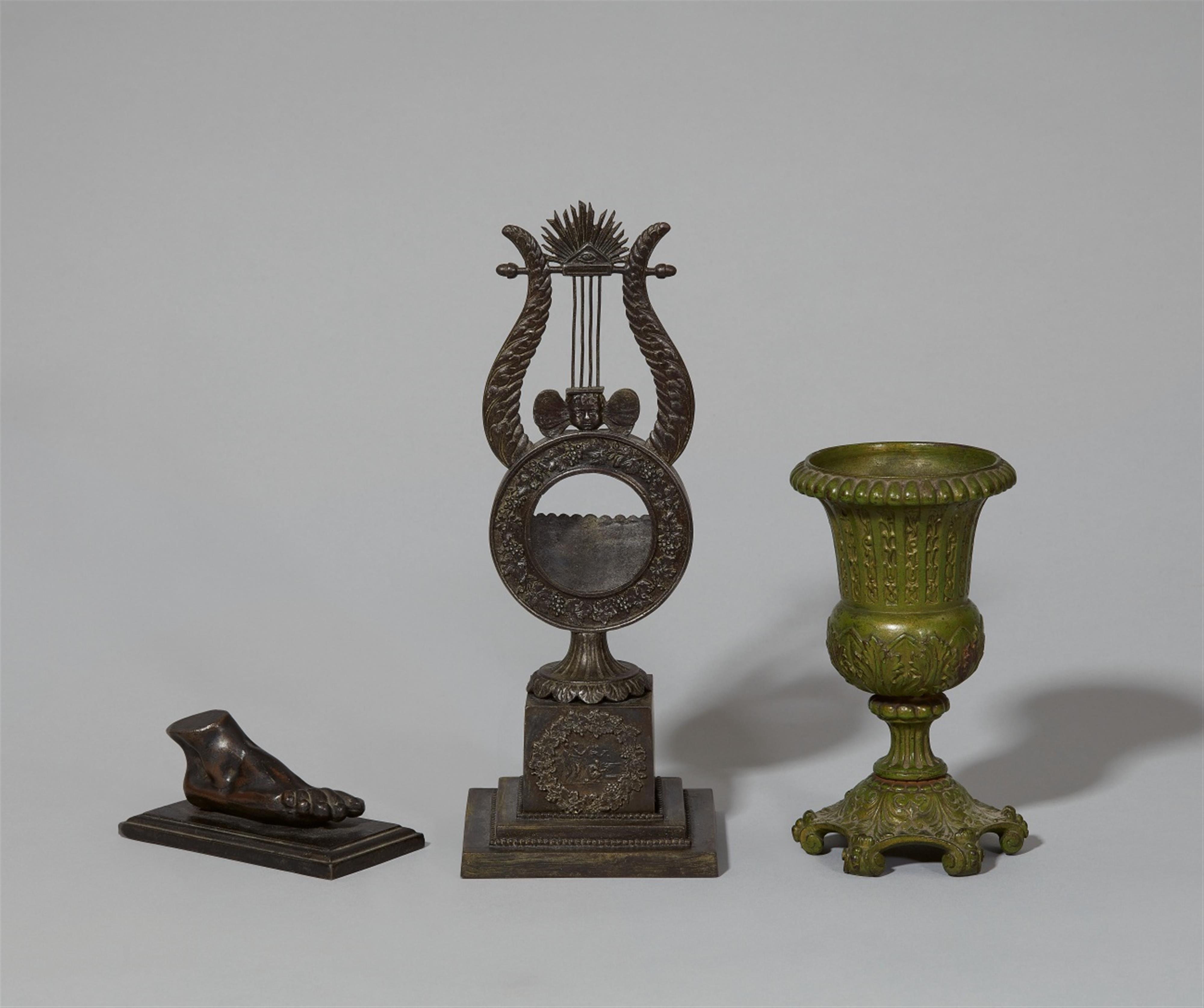 Three cast iron table ornaments - image-1