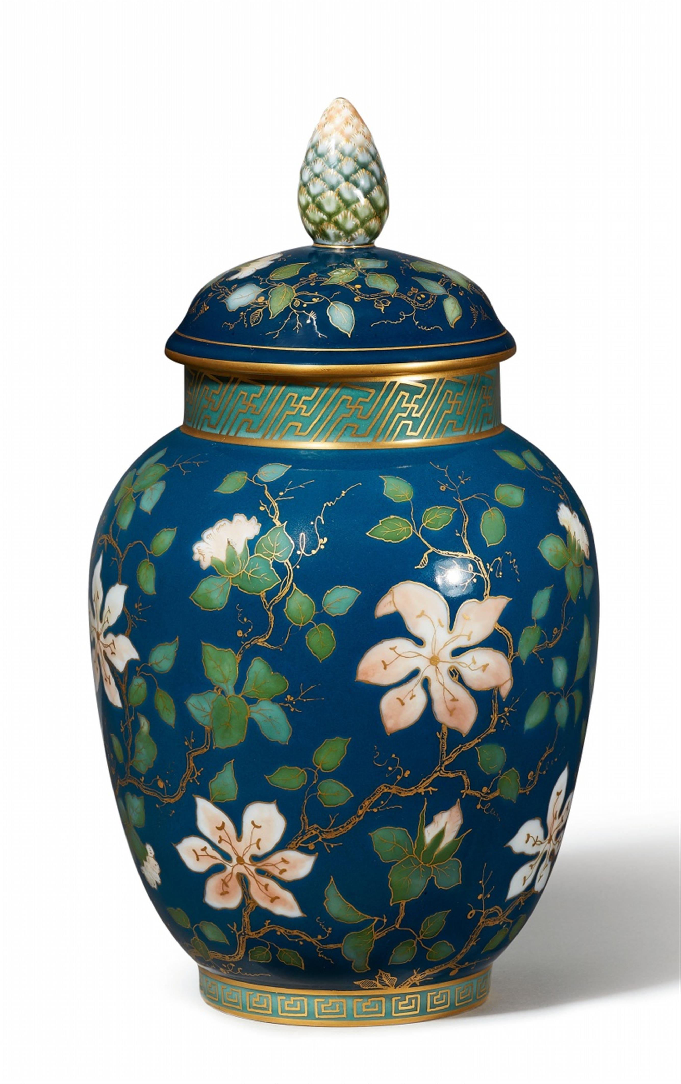A Berlin KPM porcelain vase and cover with prunus flower decor - image-1