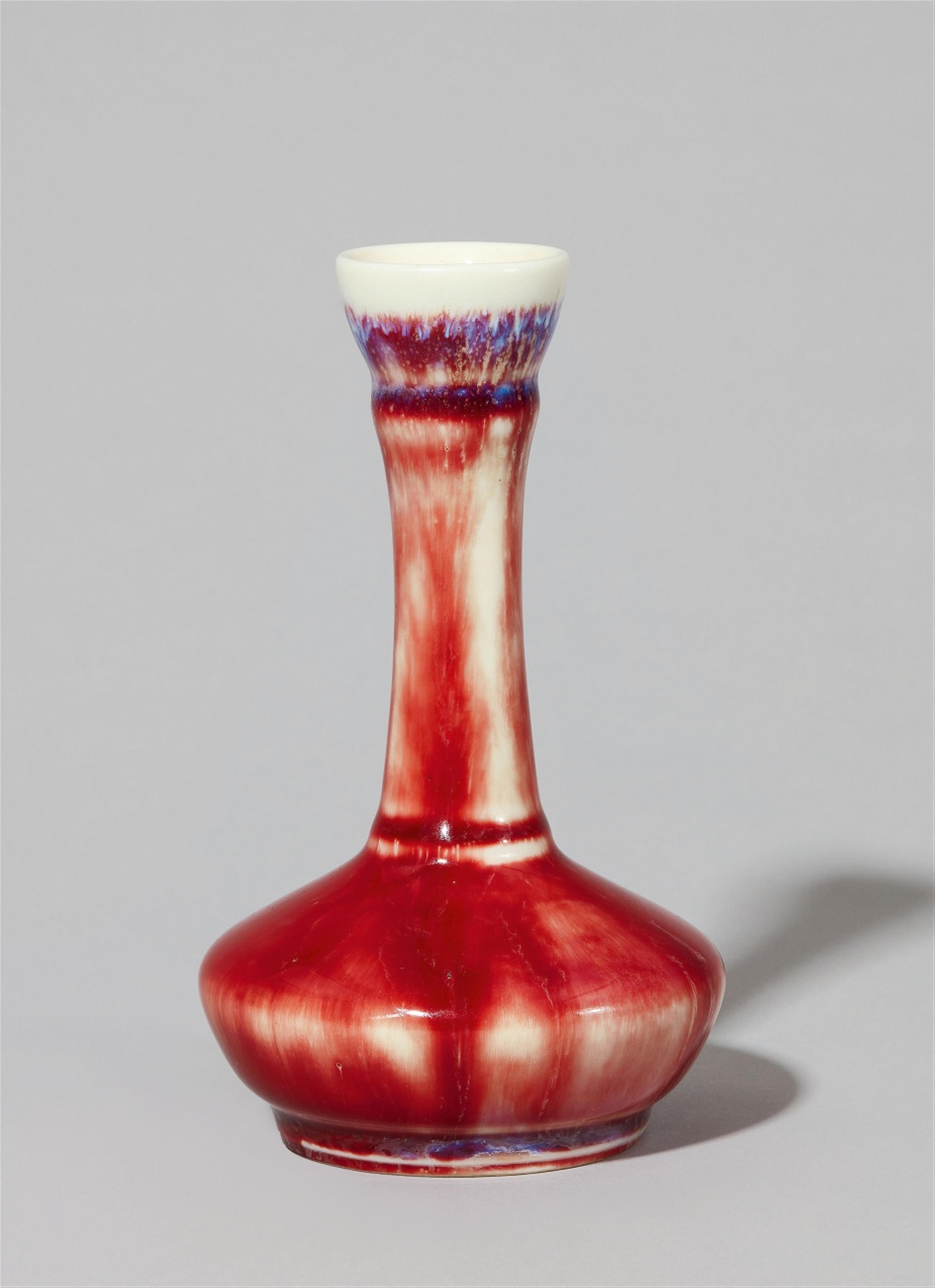 A small Berlin KPM porcelain vase with an experimental glaze - image-1