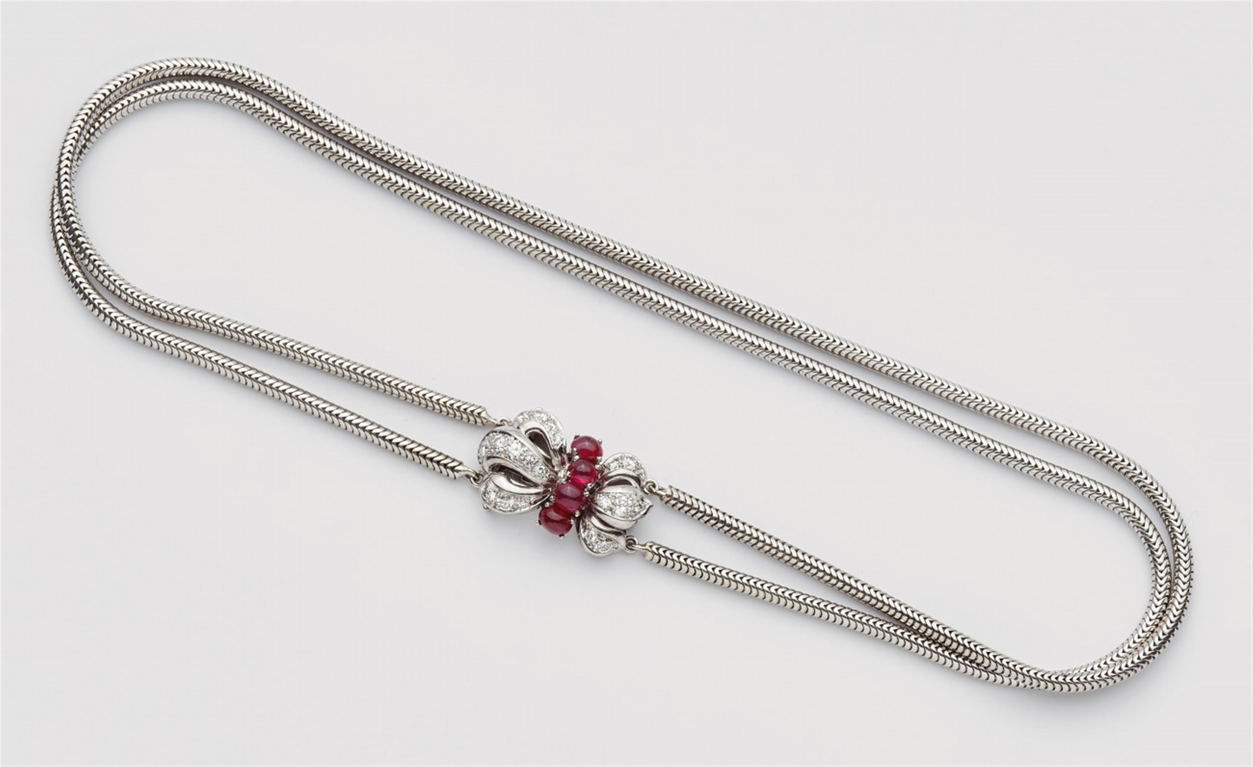 An 18k white gold necklace with a ruby clasp - image-1