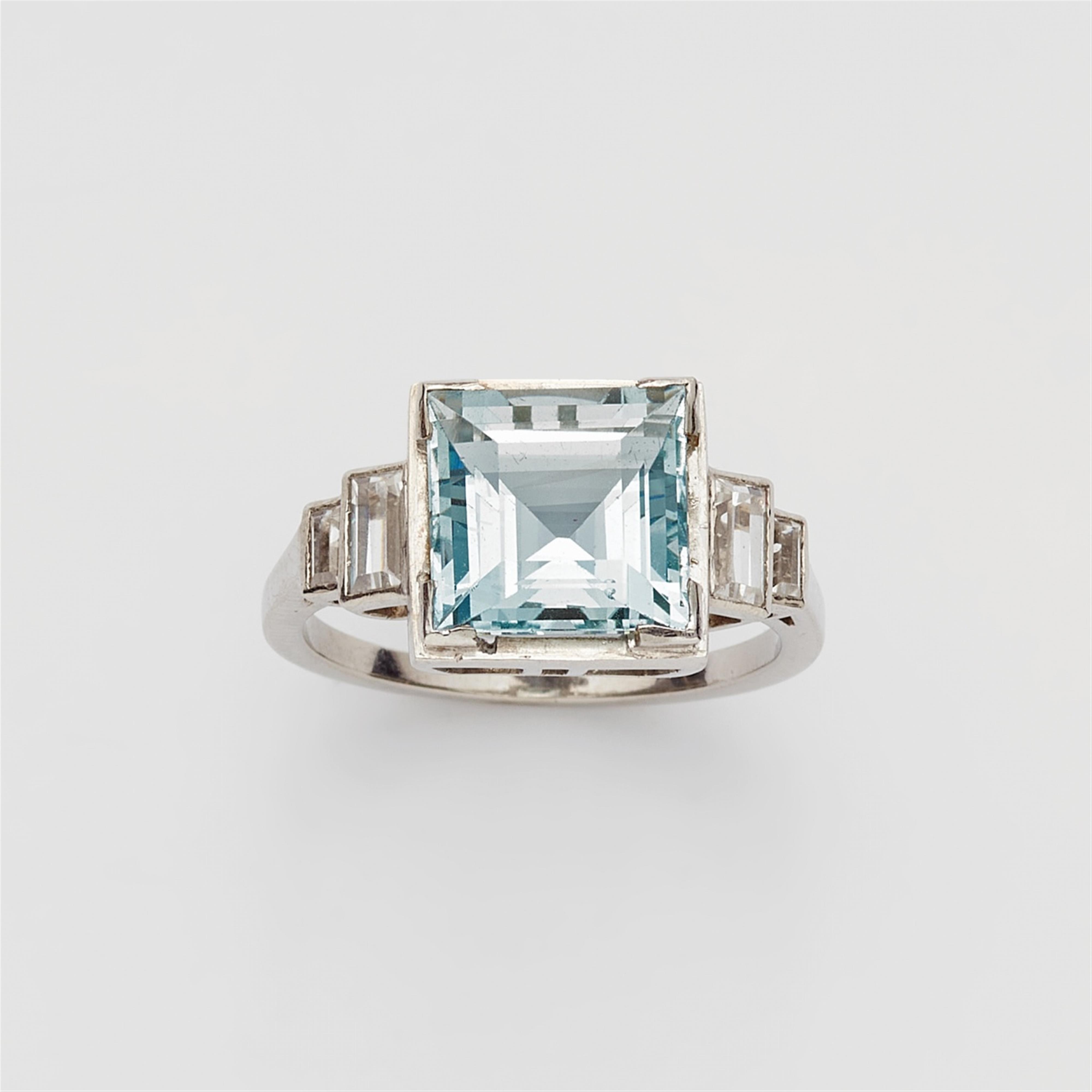 A platinum and aquamarine ring - image-1