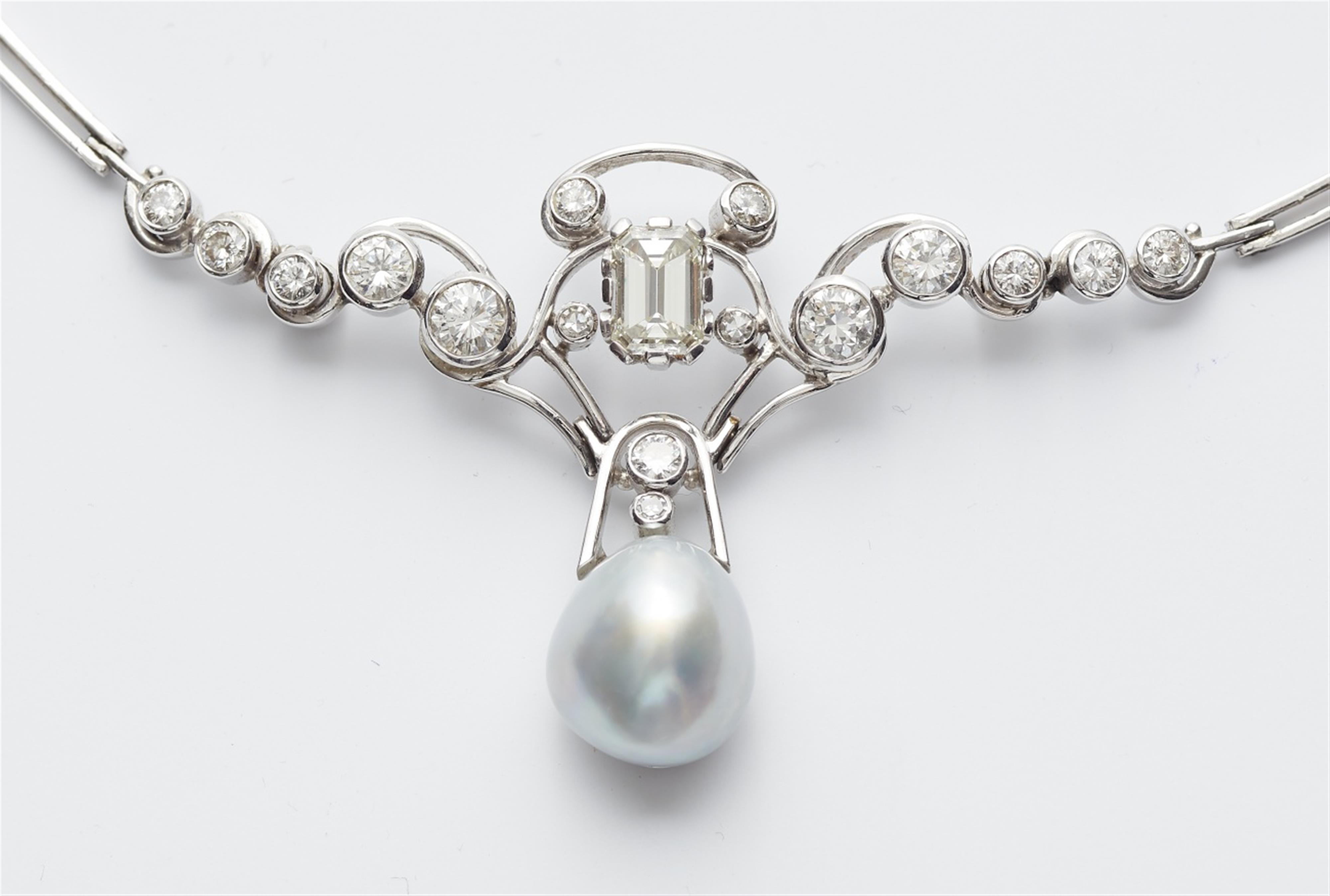 A 14k white gold diamond and pearl necklace - image-3