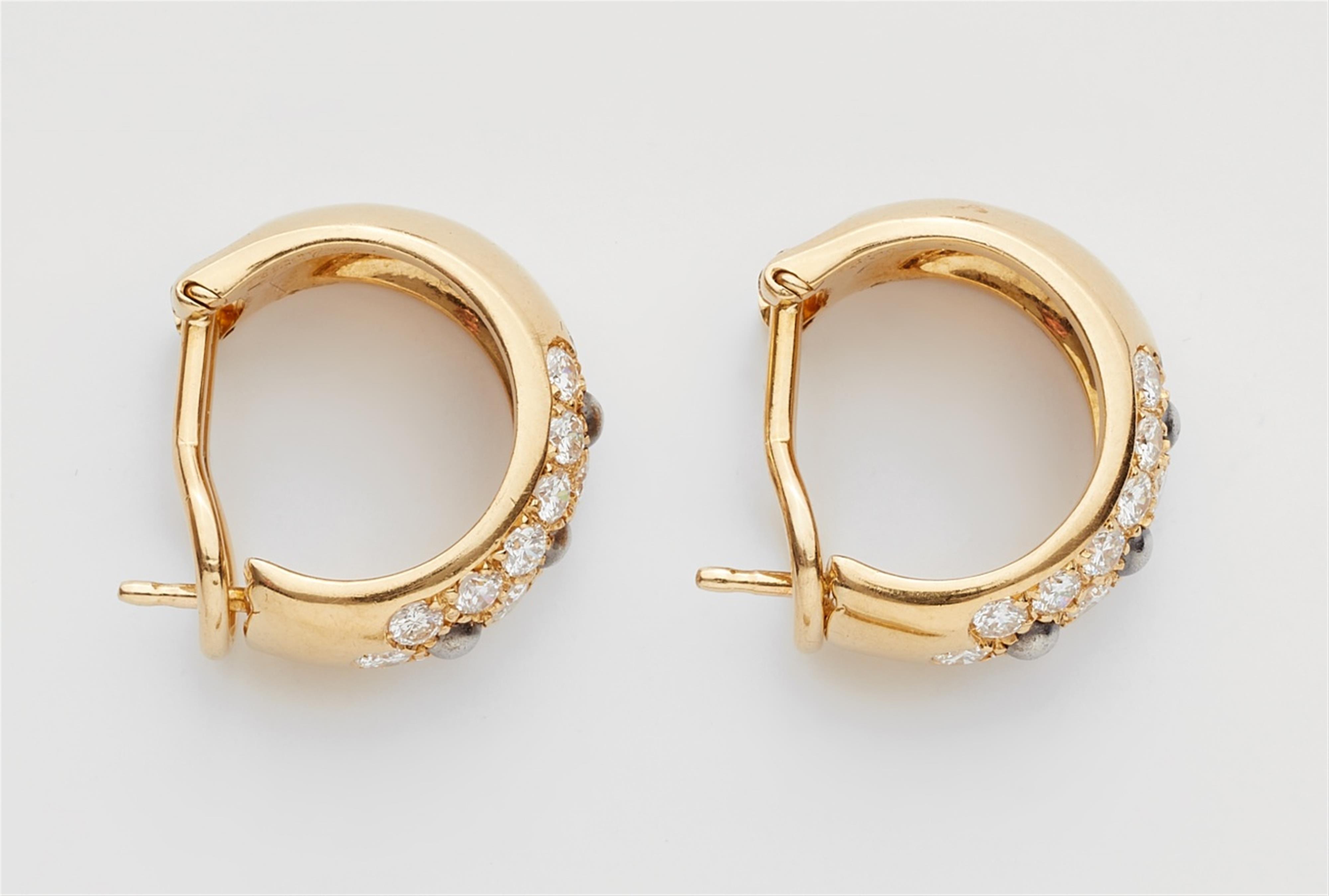 A pair of 18k gold hoop earrings - image-2