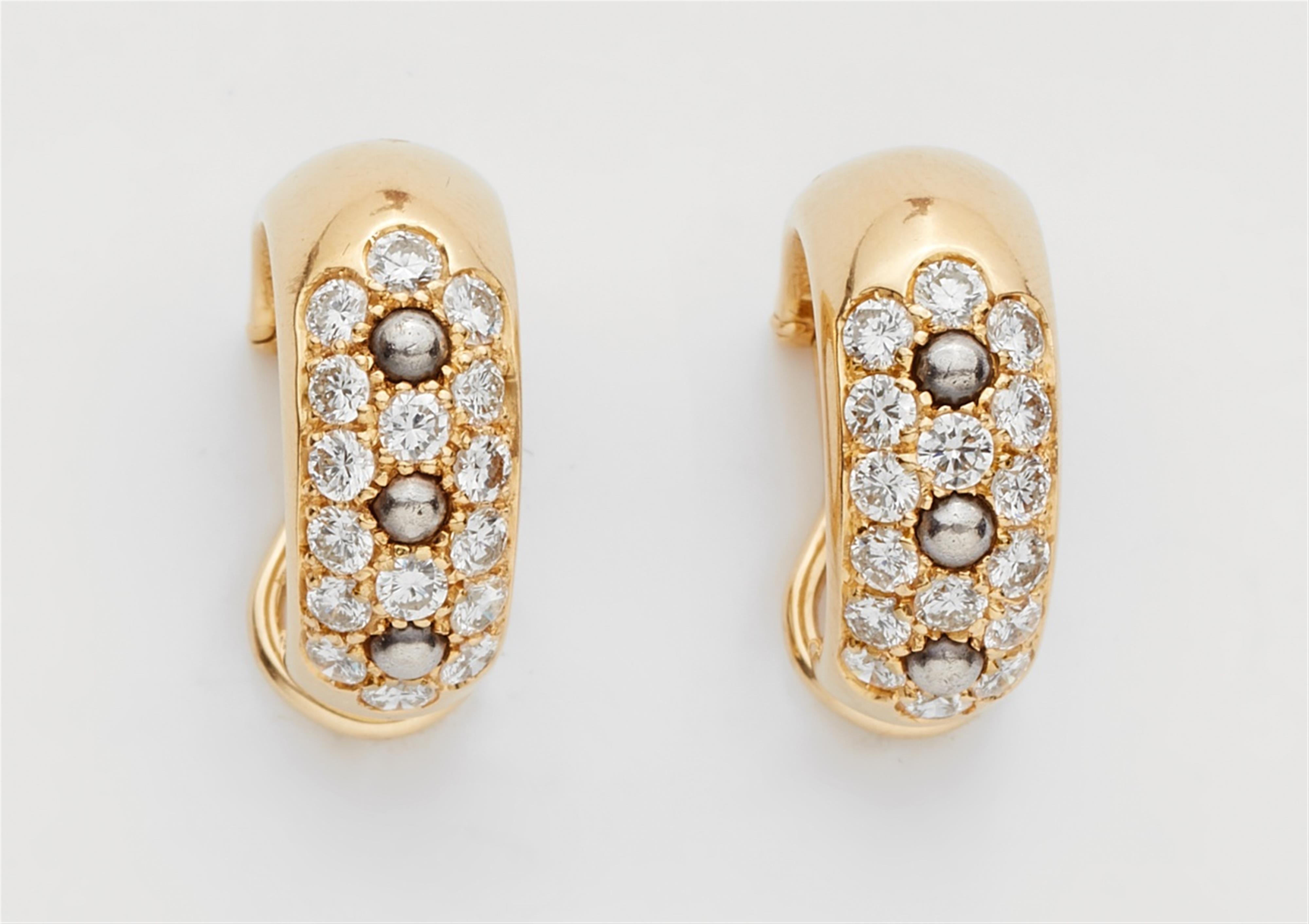 A pair of 18k gold hoop earrings - image-1