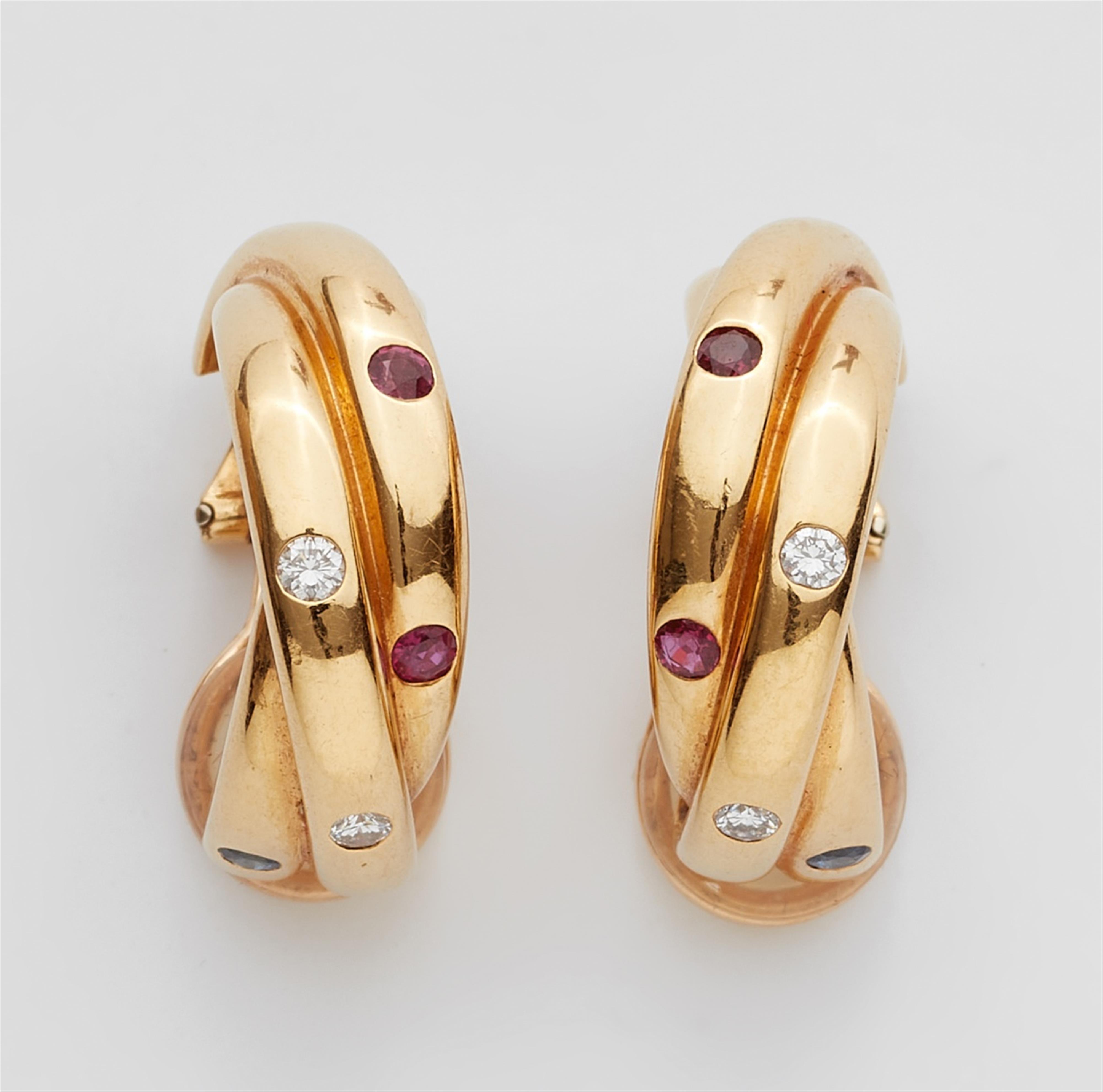 A pair of 18k gold and coloured gemstone trinity clip earrings - image-1