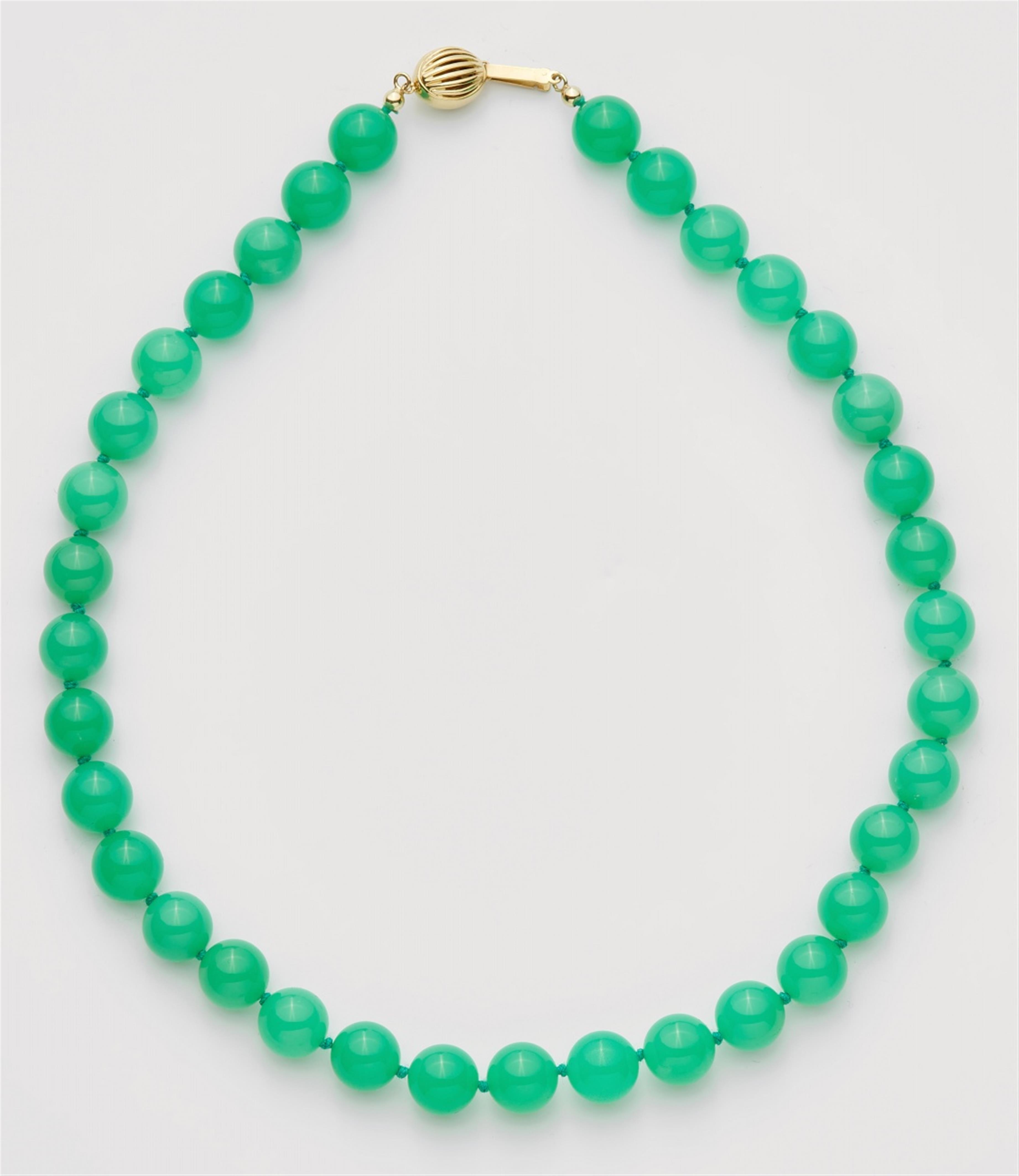 A 14k gold and chrysoprase necklace and pair of earrings - image-1