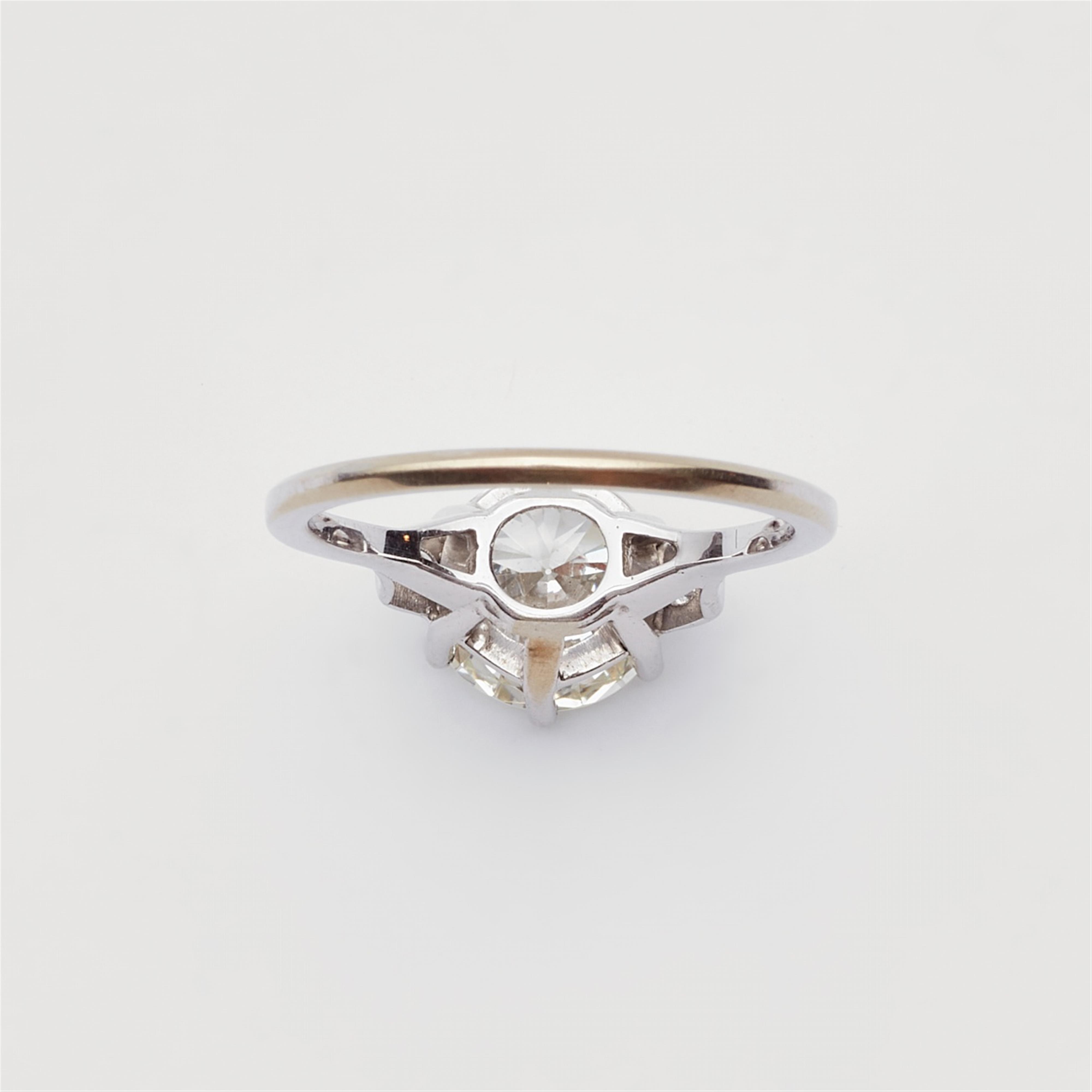 A 14k white gold diamond solitaire ring - image-3