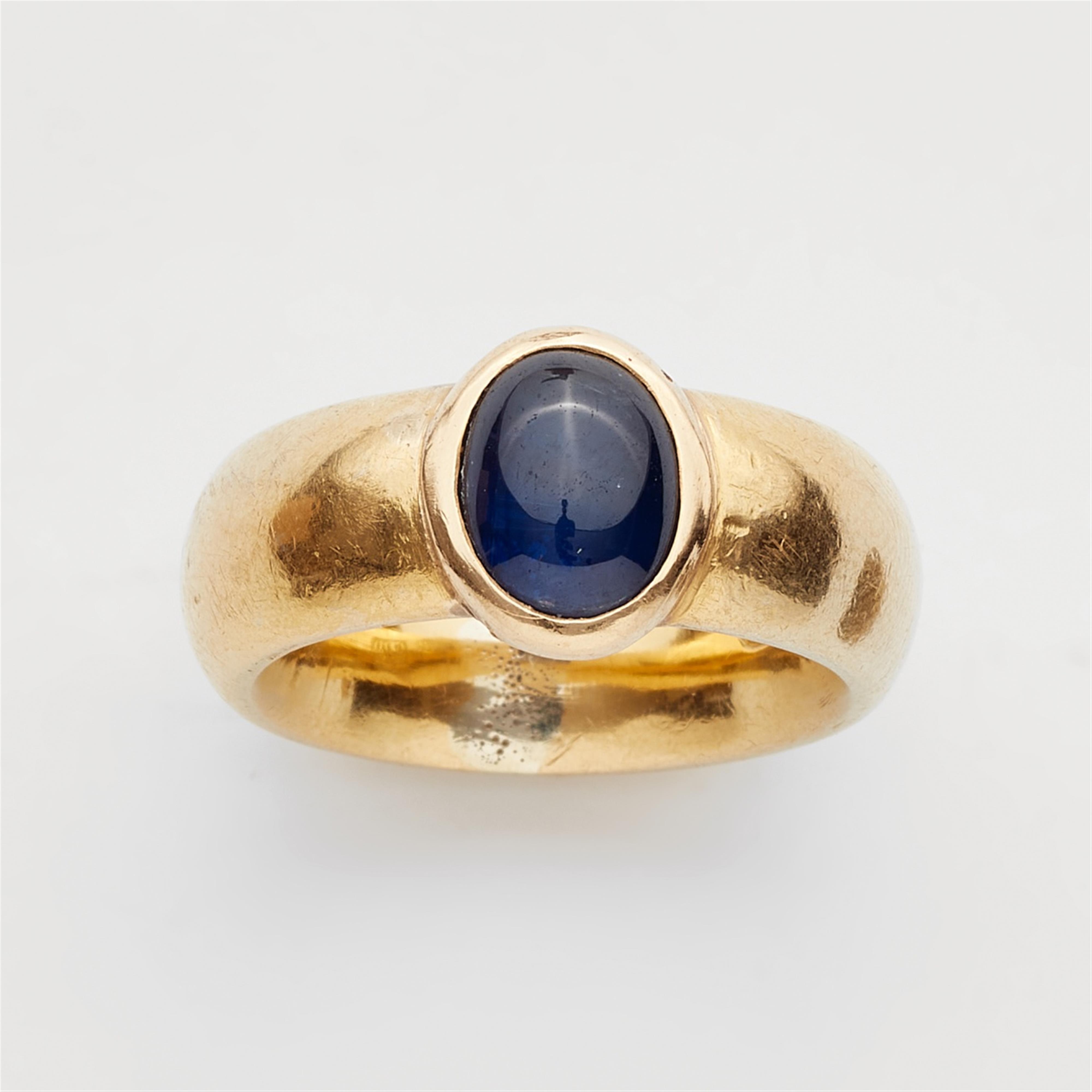 A 21k gold and sapphire ring - image-1
