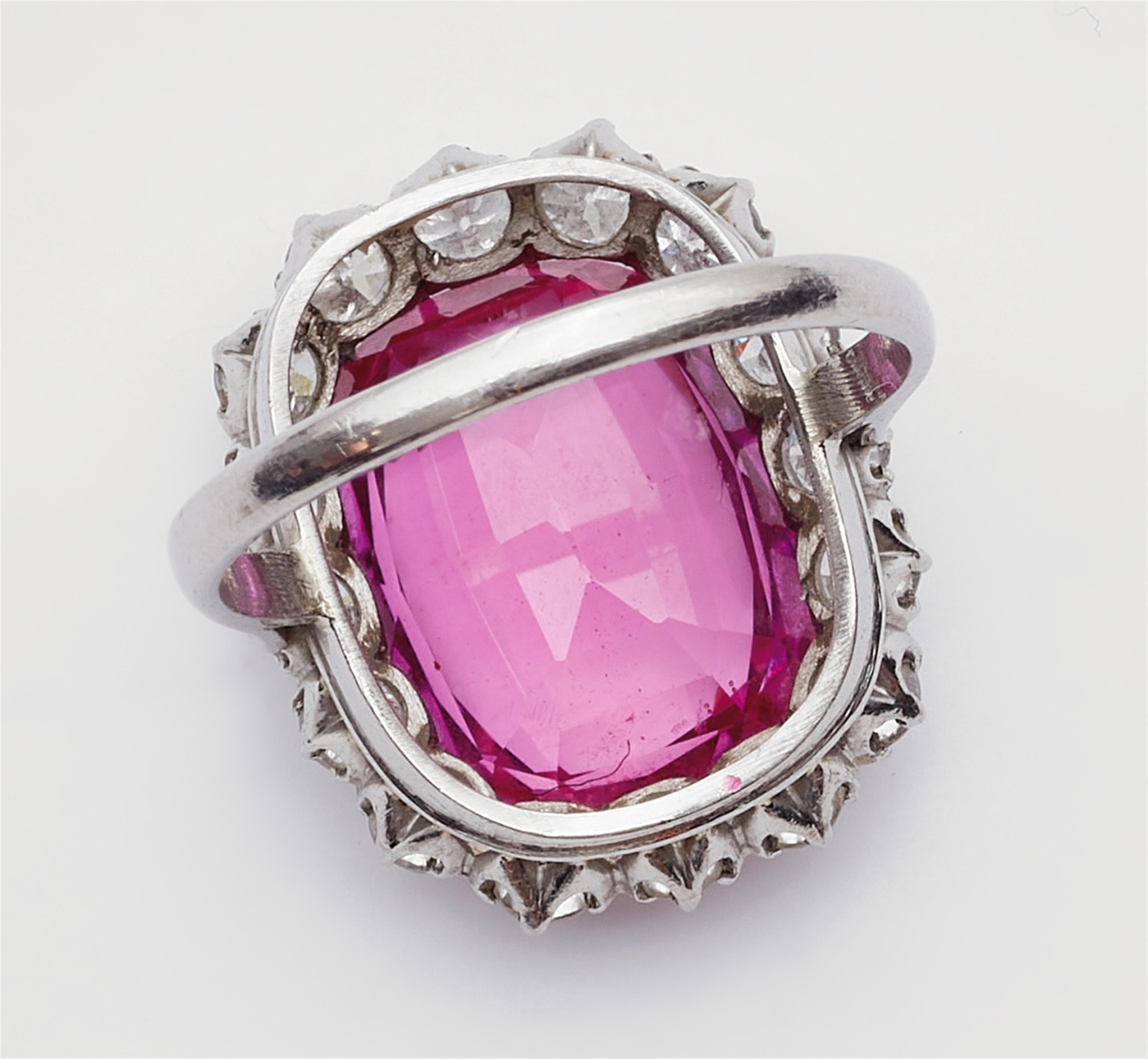 A platinum cocktail ring with a pink Verneuil sapphire - image-4