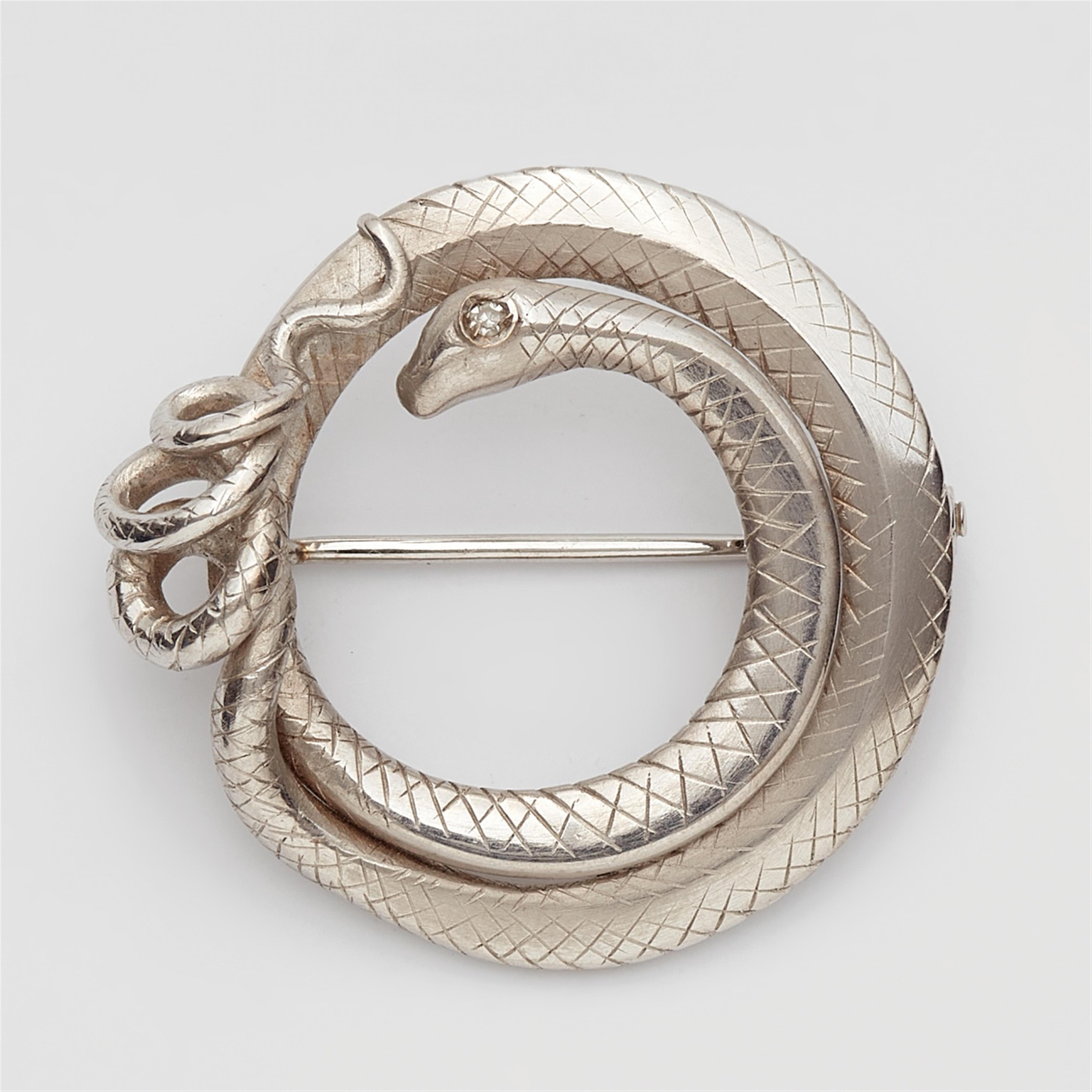 An 18k white gold snake brooch - image-1