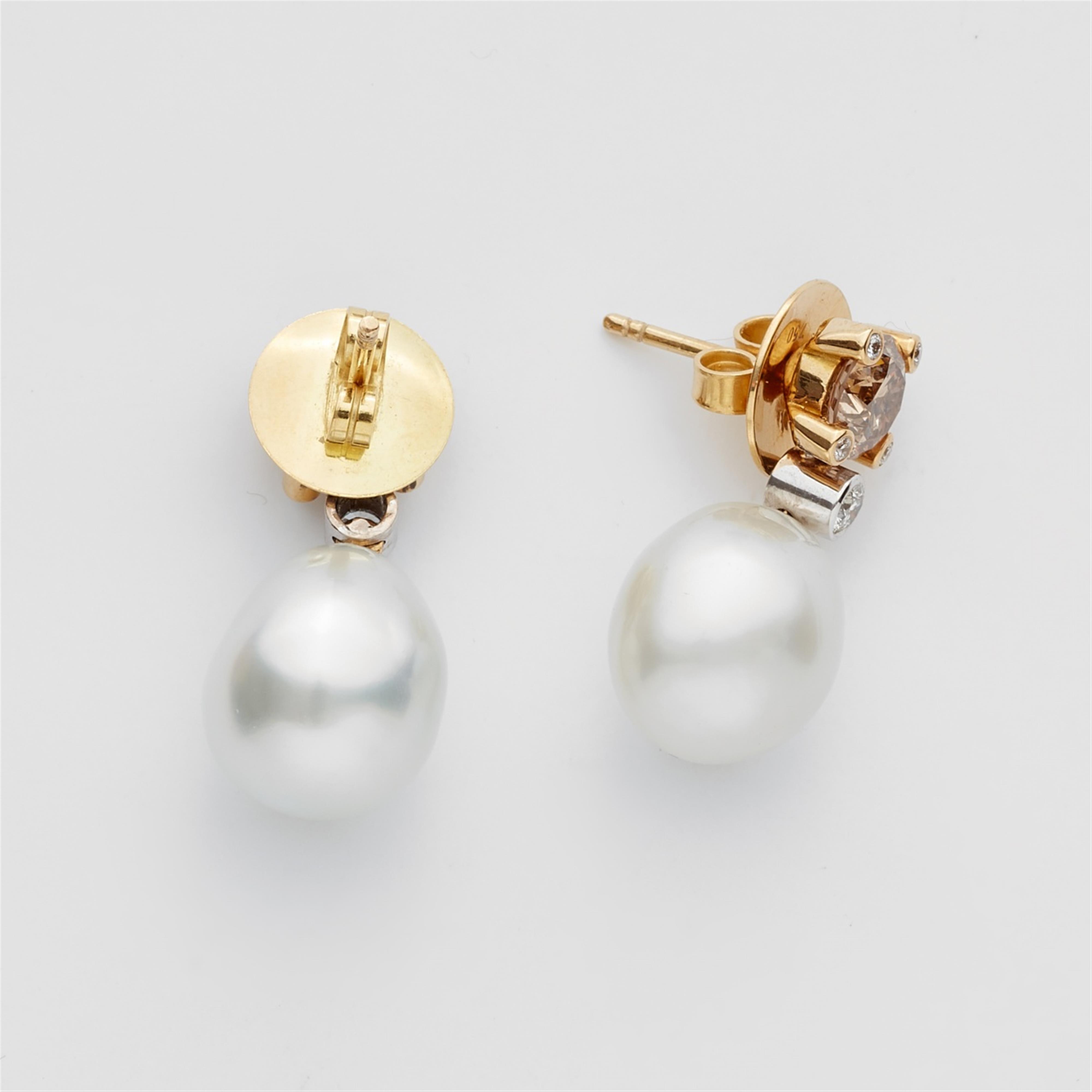 A pair of 18k gold, pearl and fancy diamond earrings - image-2