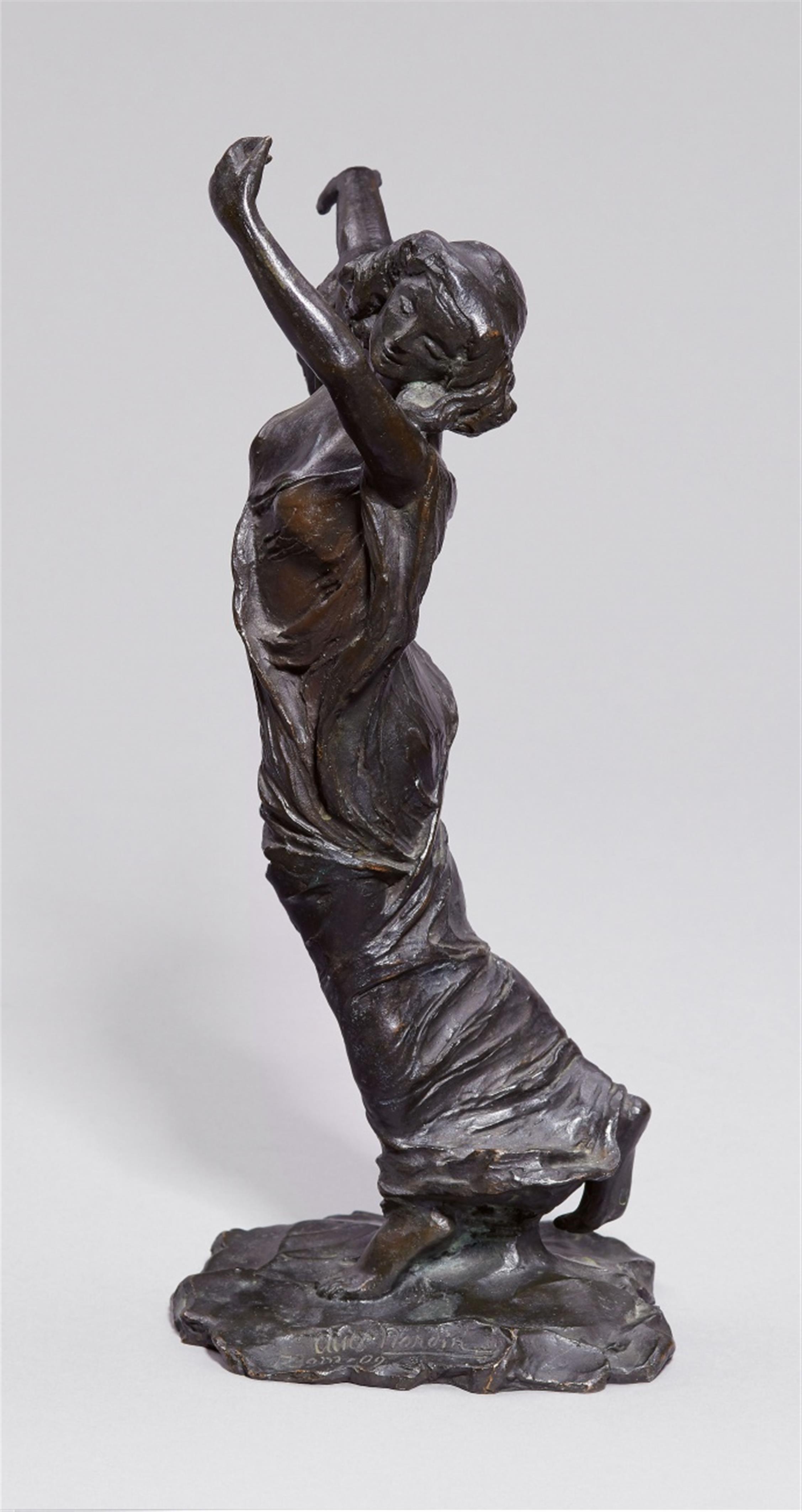 A bronze figure of a veil dancer - image-2