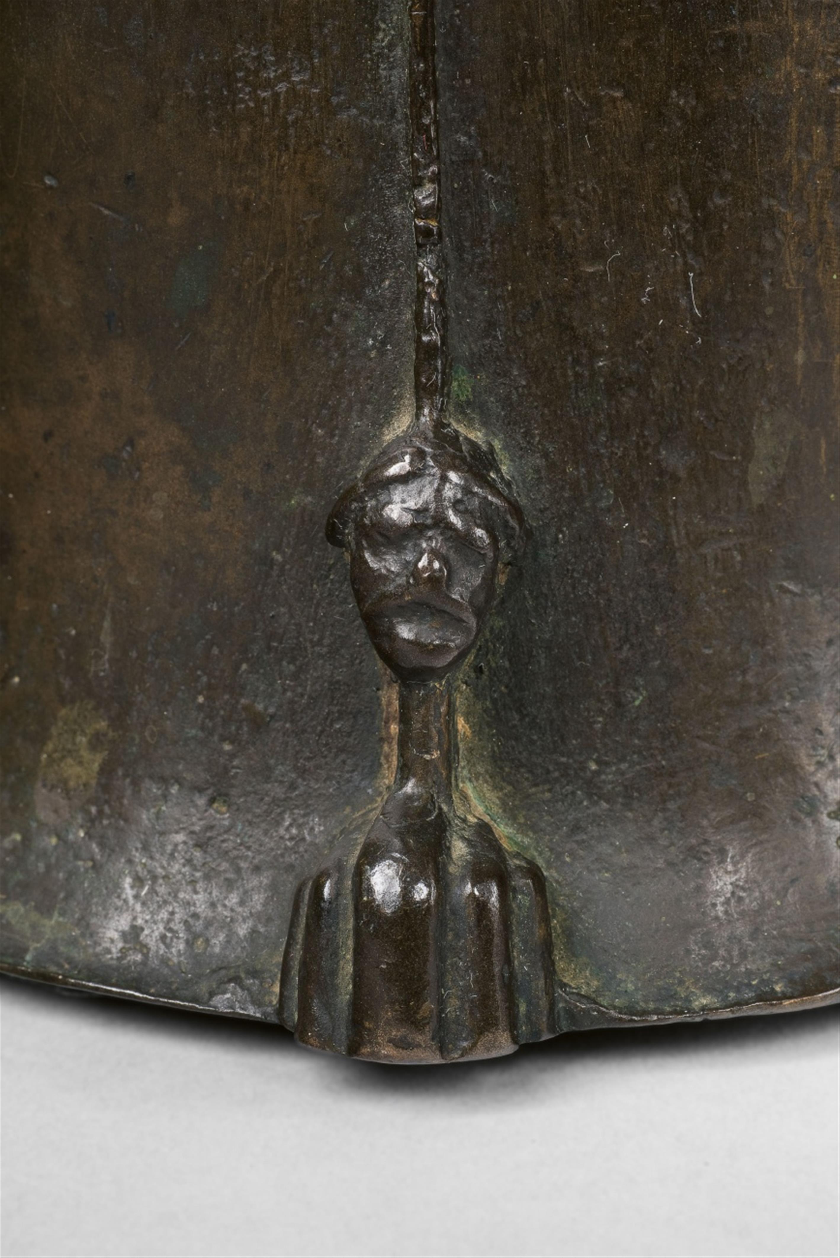 A magnificent one-handled mortar with male heads - image-2