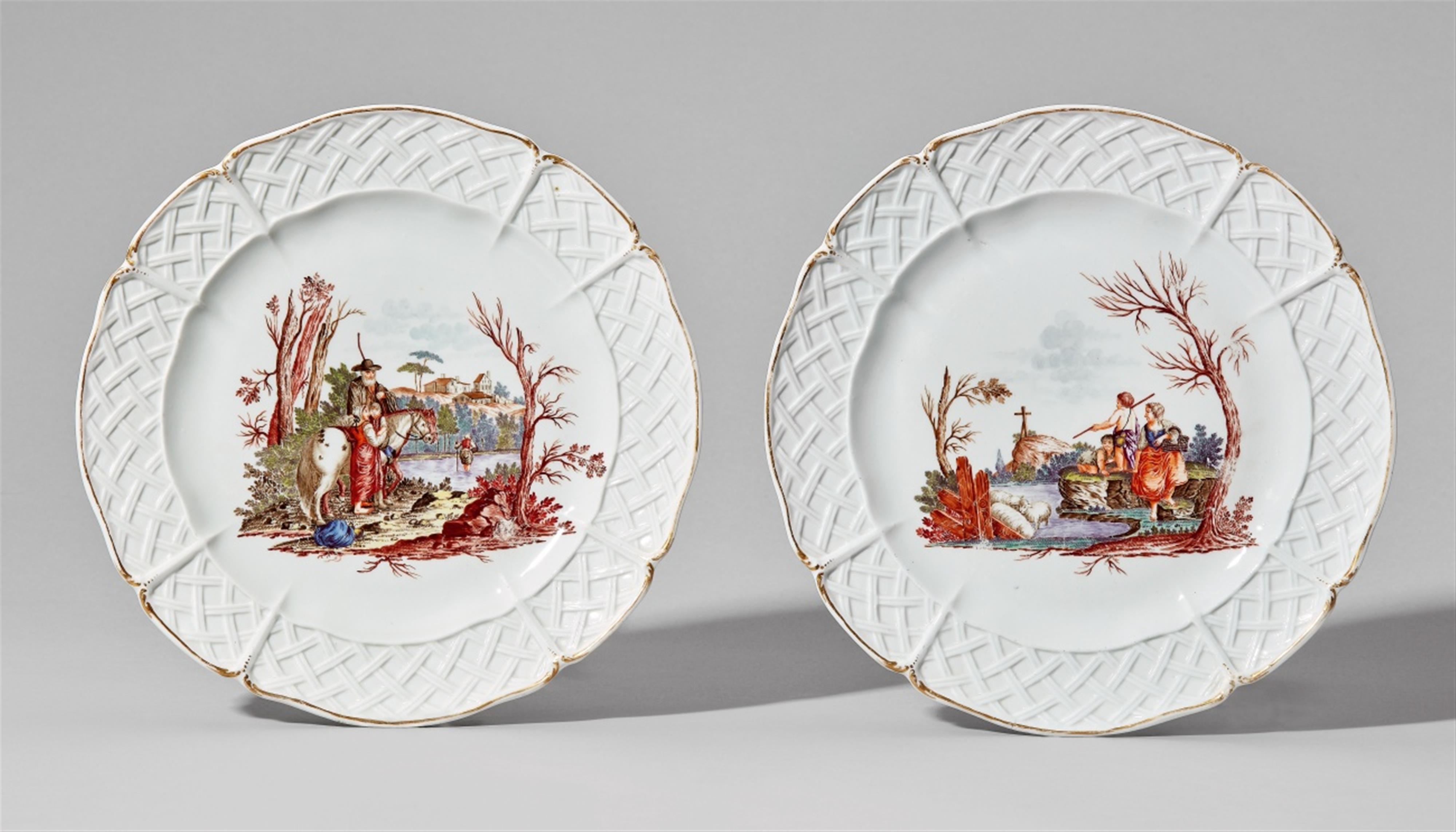 A pair of Nymphenburg porcelain plates with peasant scenes - image-1