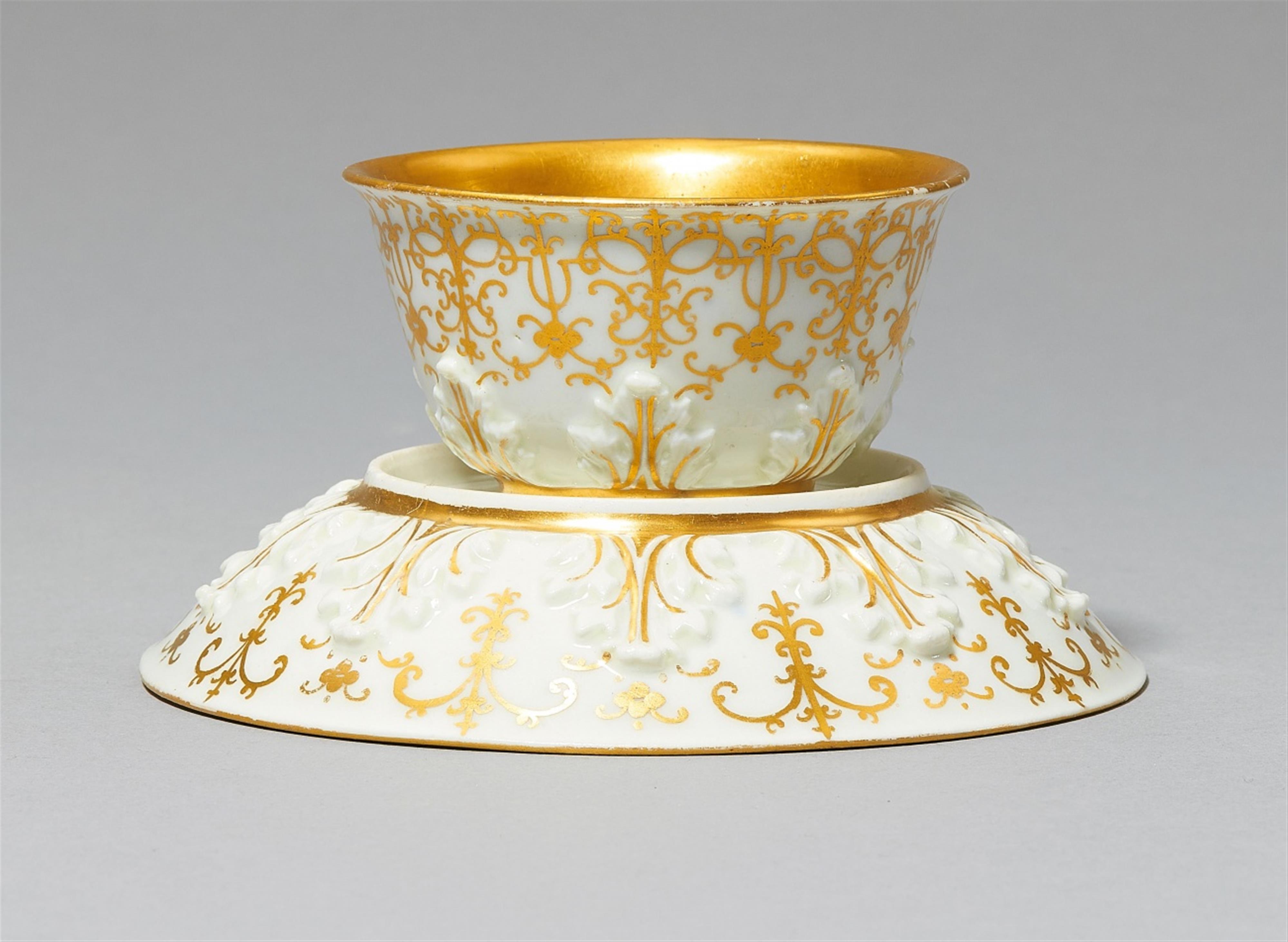 An early Meissen porcelain tea bowl with acanthus relief - image-2
