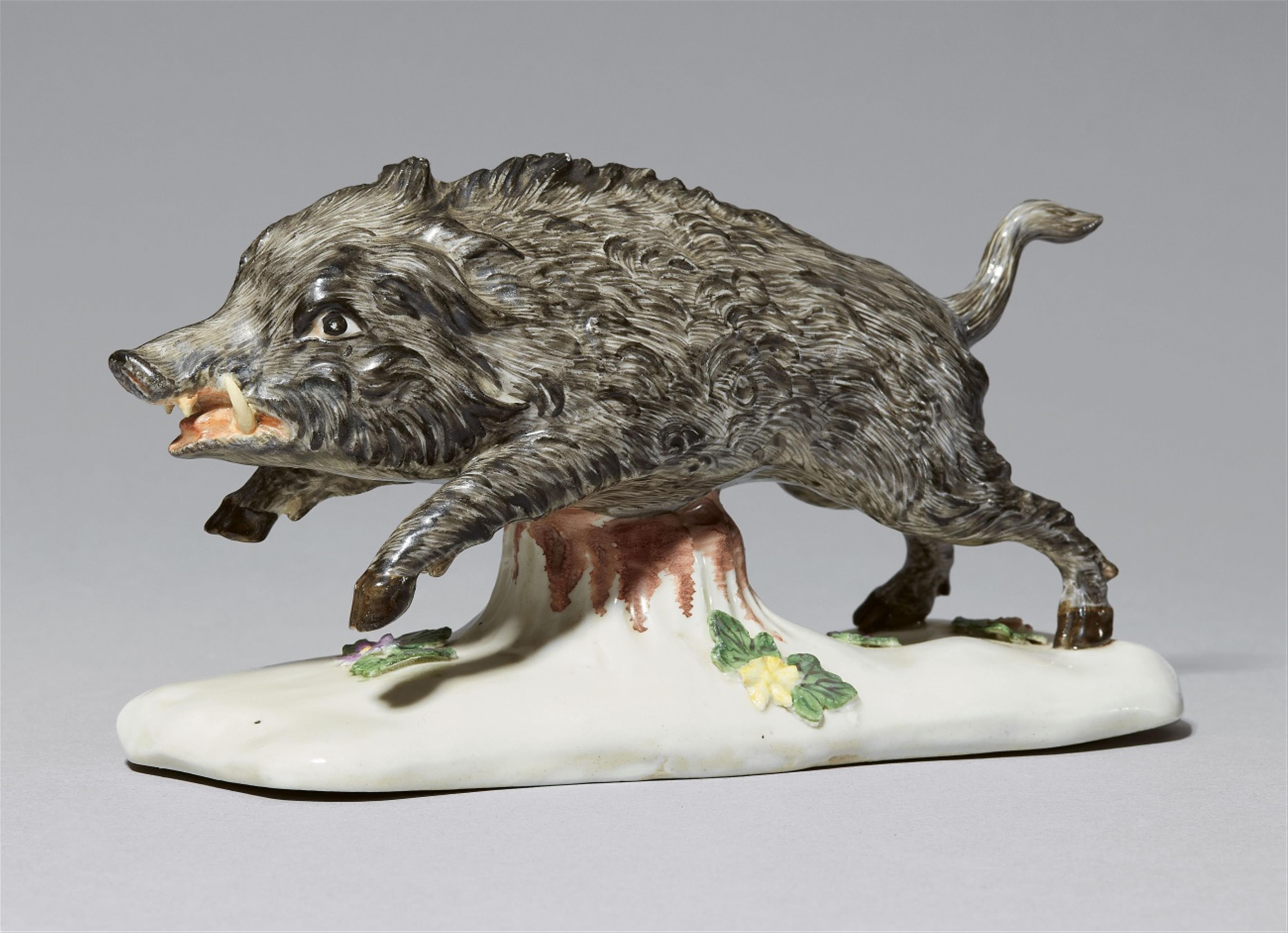 A rare Höchst porcelain figure of a running boar - image-1