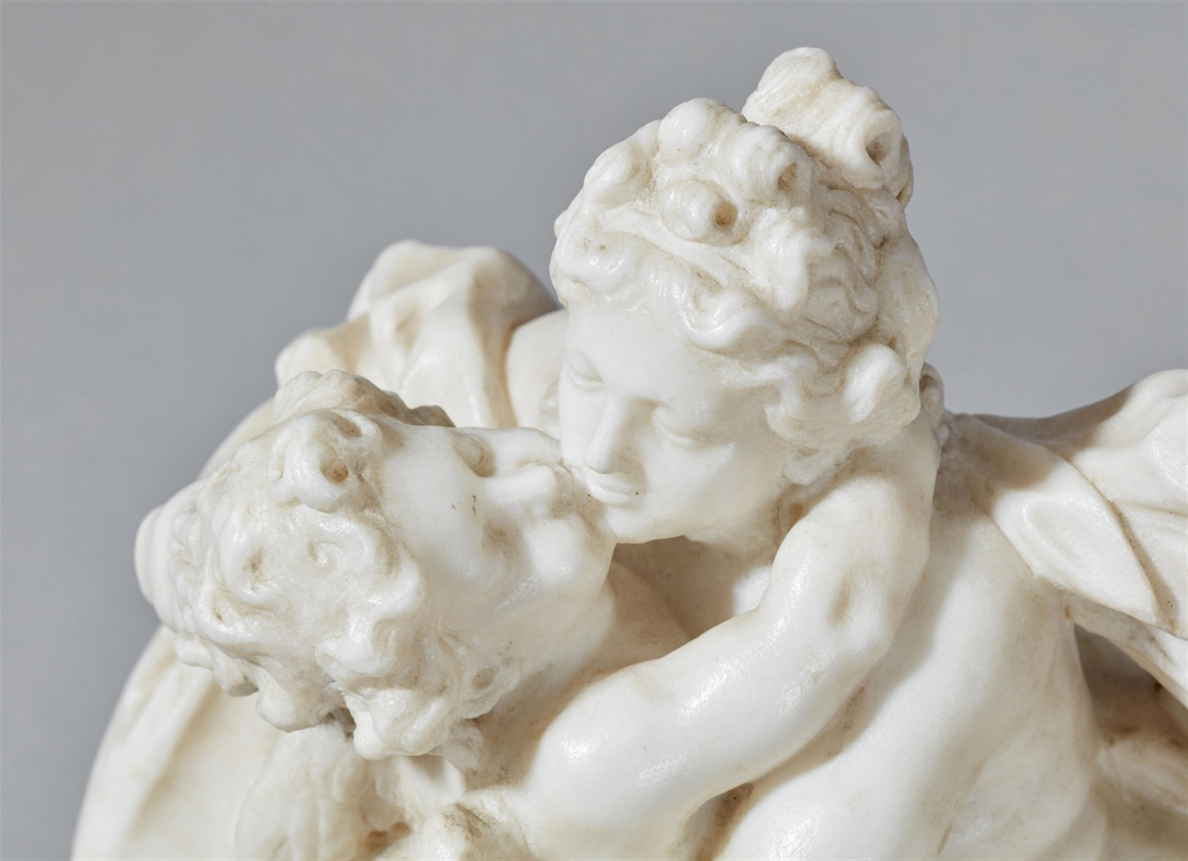 A white marble group of Venus and Cupid - image-4