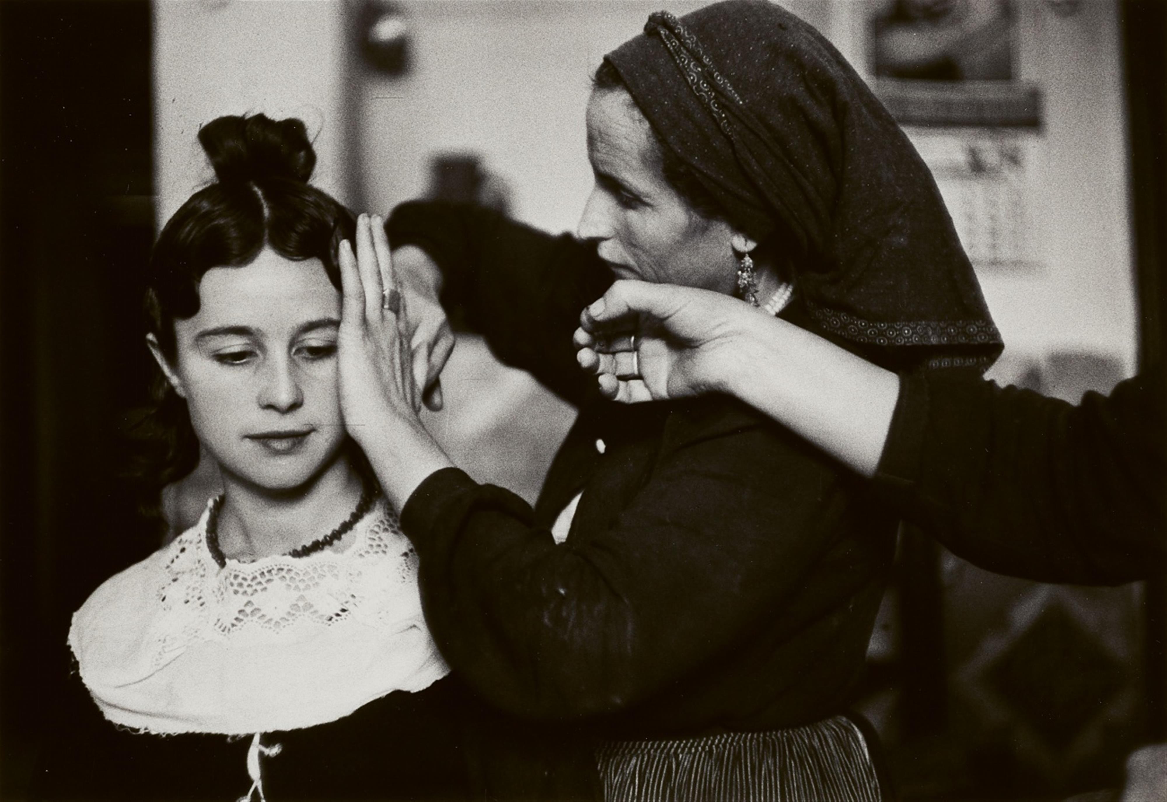 Inge Morath - Navalcan, Old Castille, Bridesmaid being coiffed by sister and grandmother - image-1