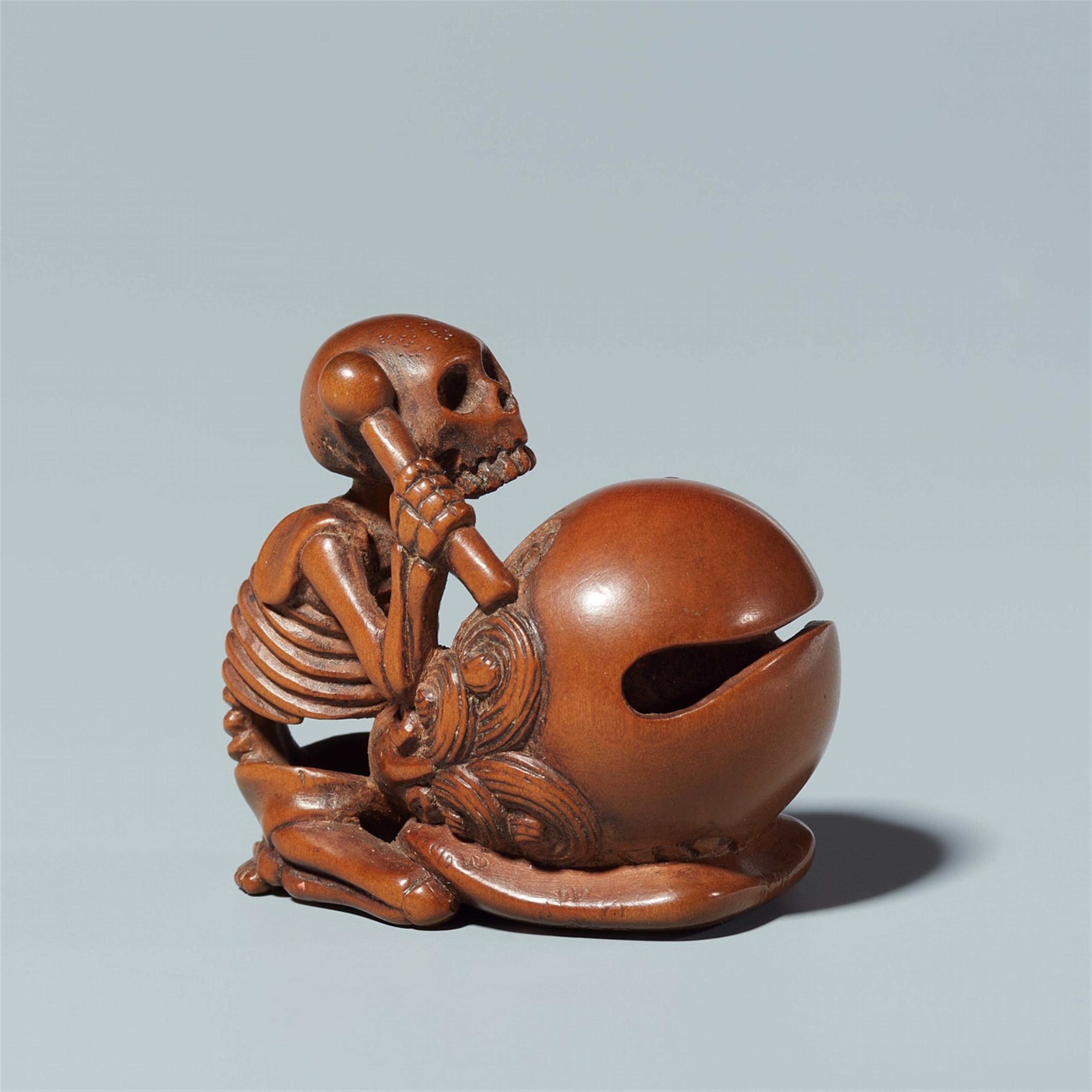 A wood netsuke of a skeleton with a bell. First half 19th century - image-1