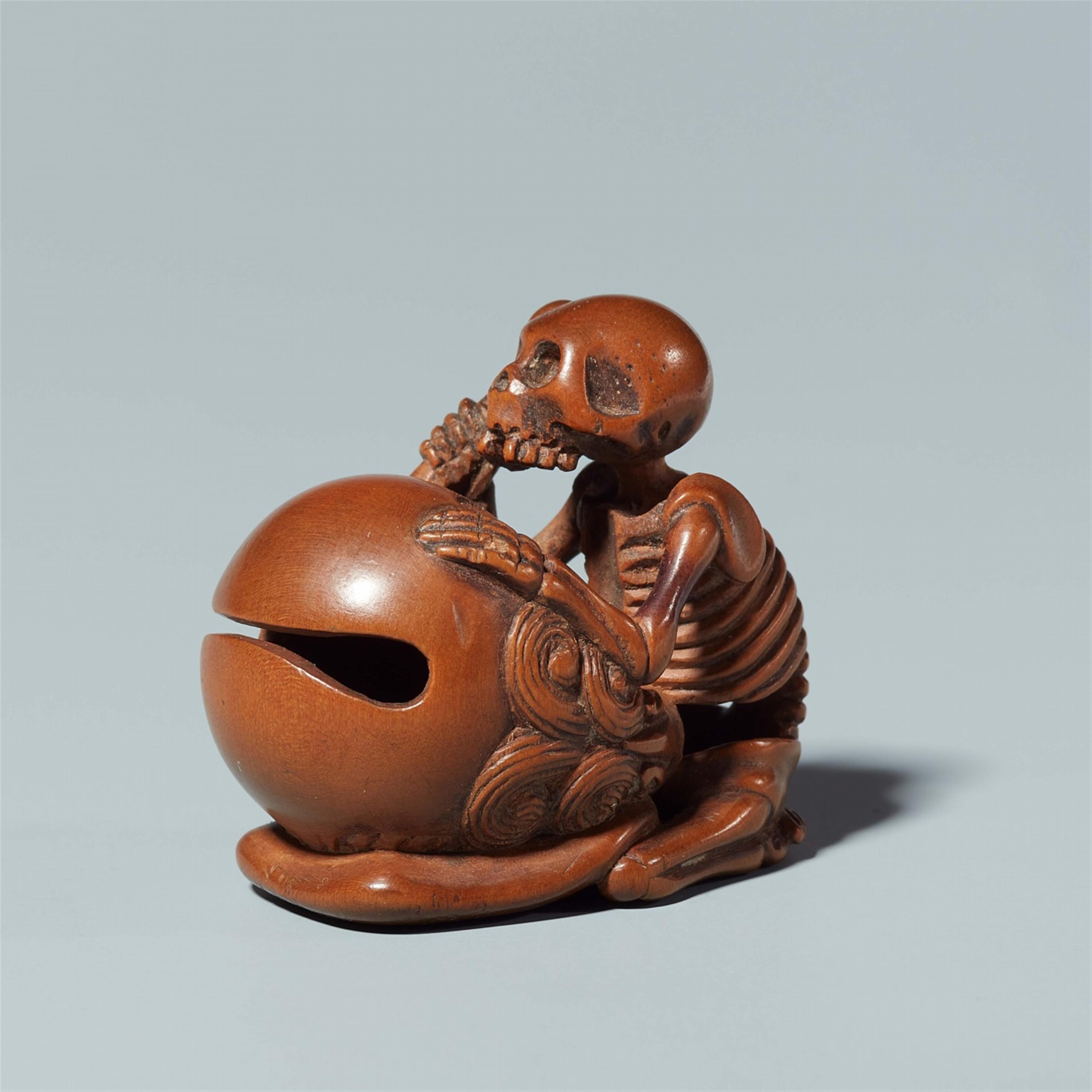 A wood netsuke of a skeleton with a bell. First half 19th century - image-2